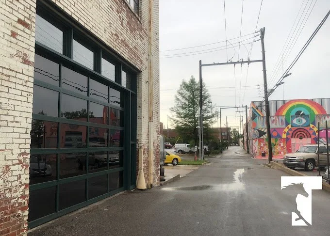 Full-view glass commercial overhead doors installed by Trotter Overhead Door