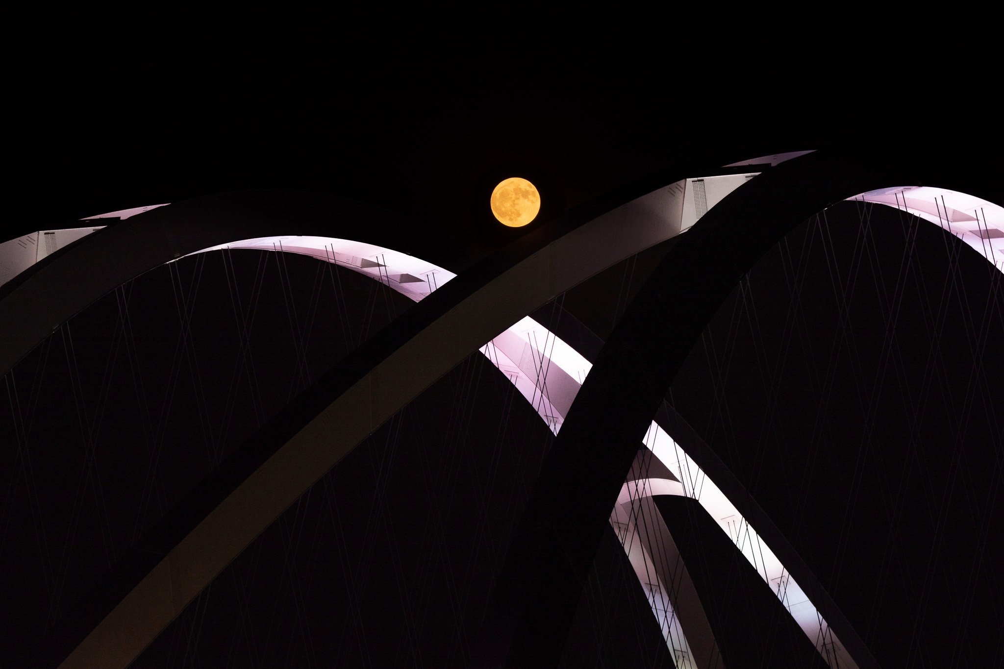 Strawberry moon at I-74 Bridge