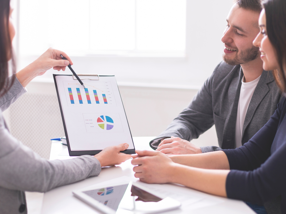 Professionals reviewing financial strategy together