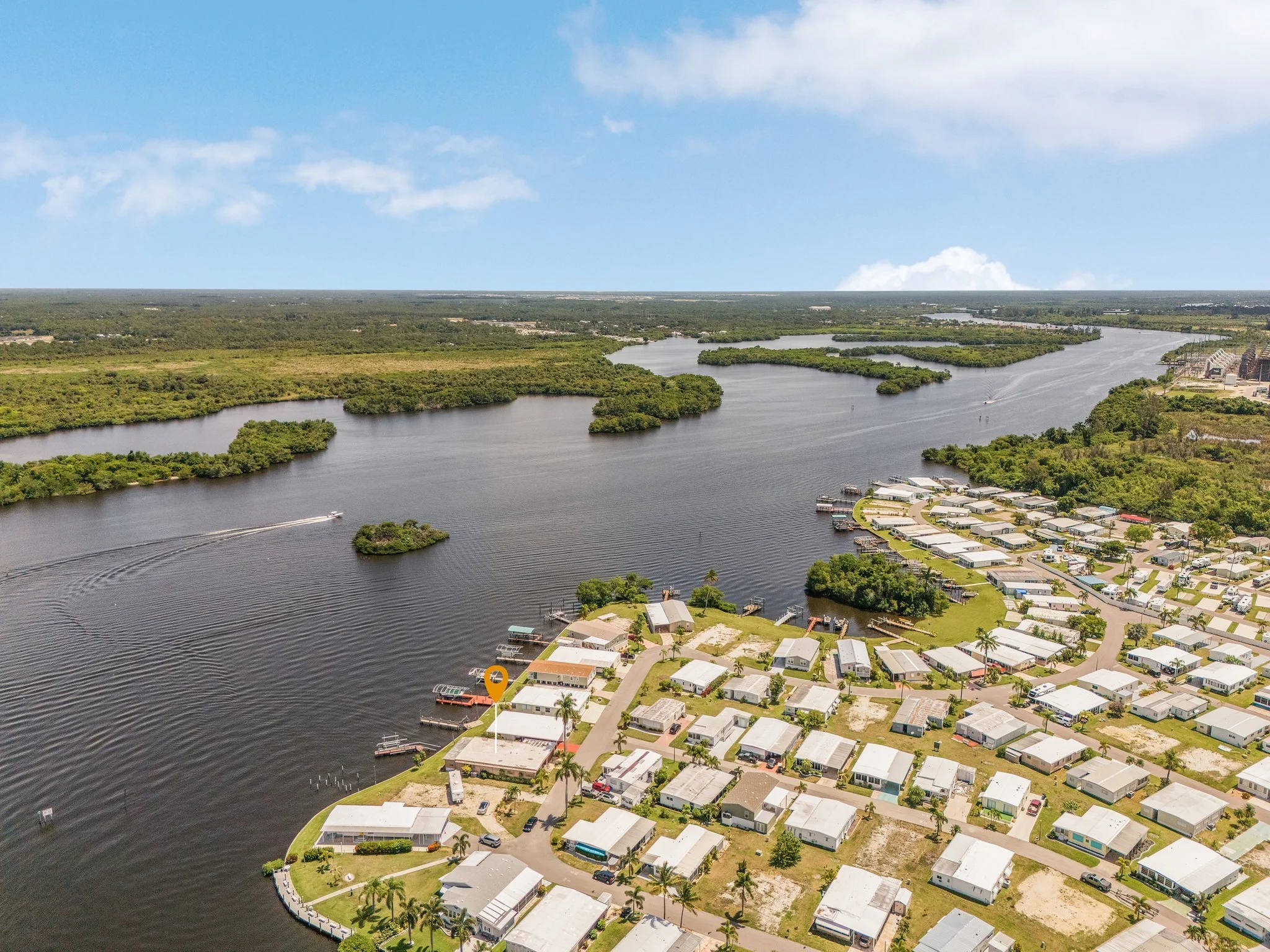 Riverfront Home with Direct Gulf Access in Gated 55+ Community $268,000!!