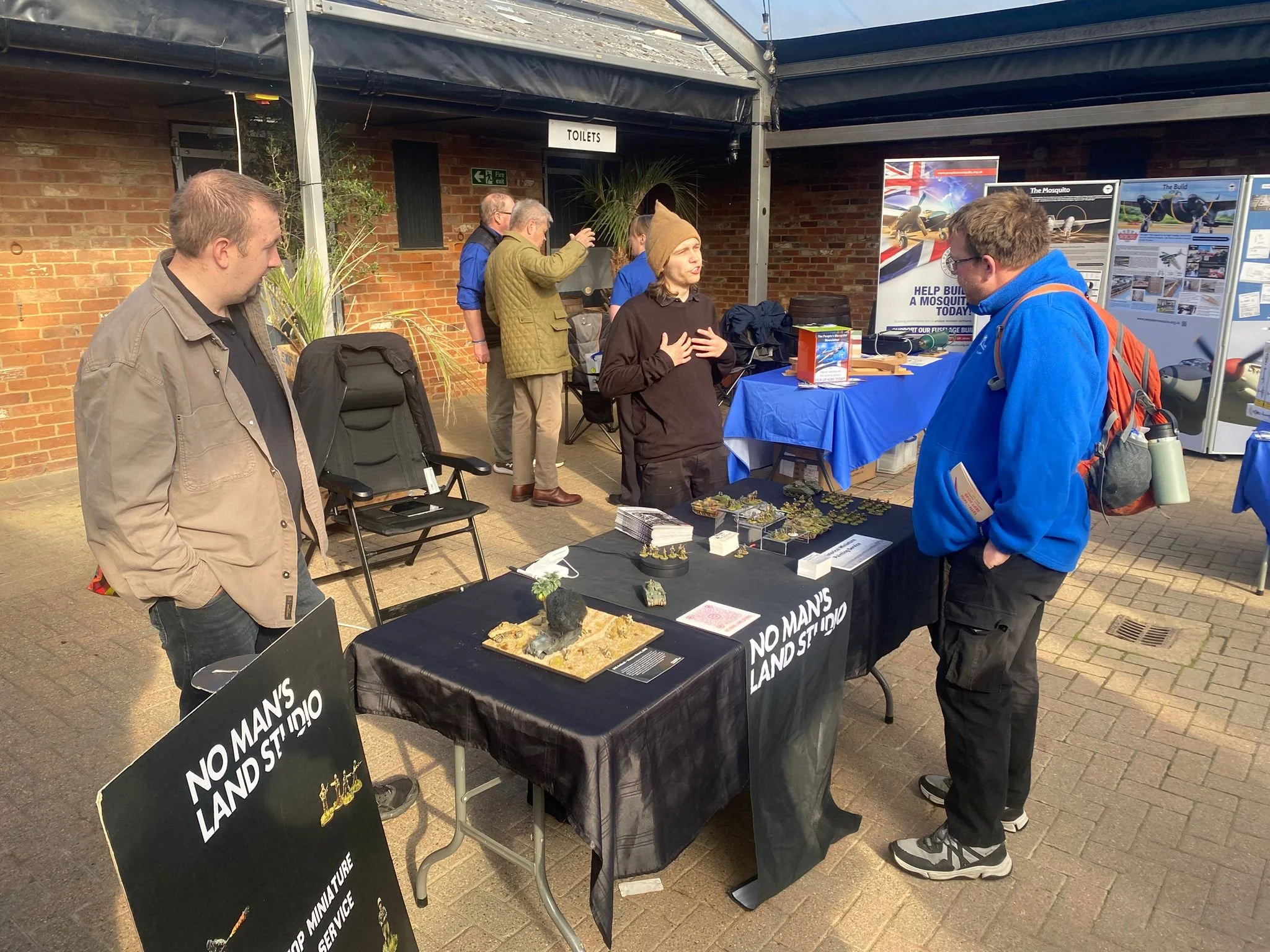 Dean and Matt talking to customer.jpeg