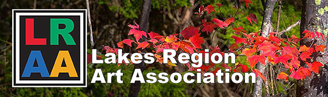Lakes Region Art Association logo with colorful leaves in the background.