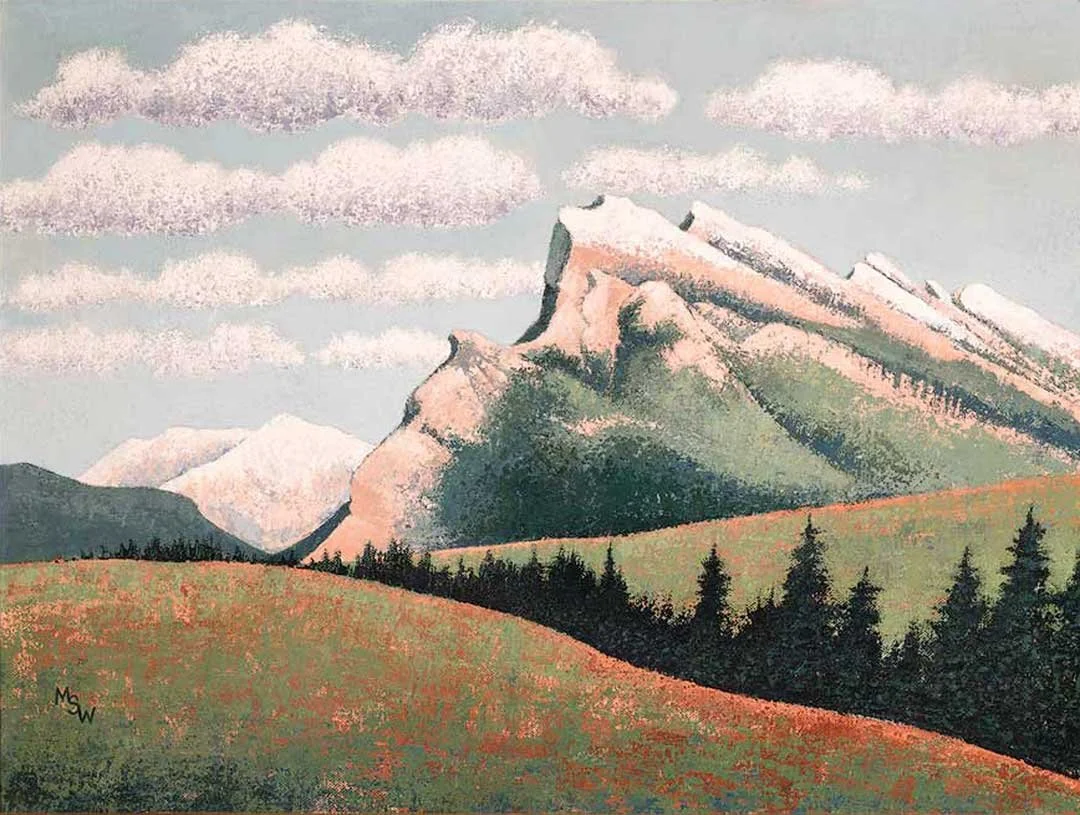 Original 24 × 18 acrylic painting of rugged, sunlit mountain peaks rising above rolling green meadows and a dark evergreen forest beneath a pale blue sky with soft white clouds.
