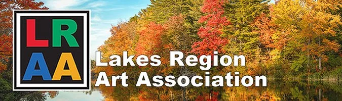 Lakes Region Art Association logo with a background of a lake surrounded by trees in fall colors.