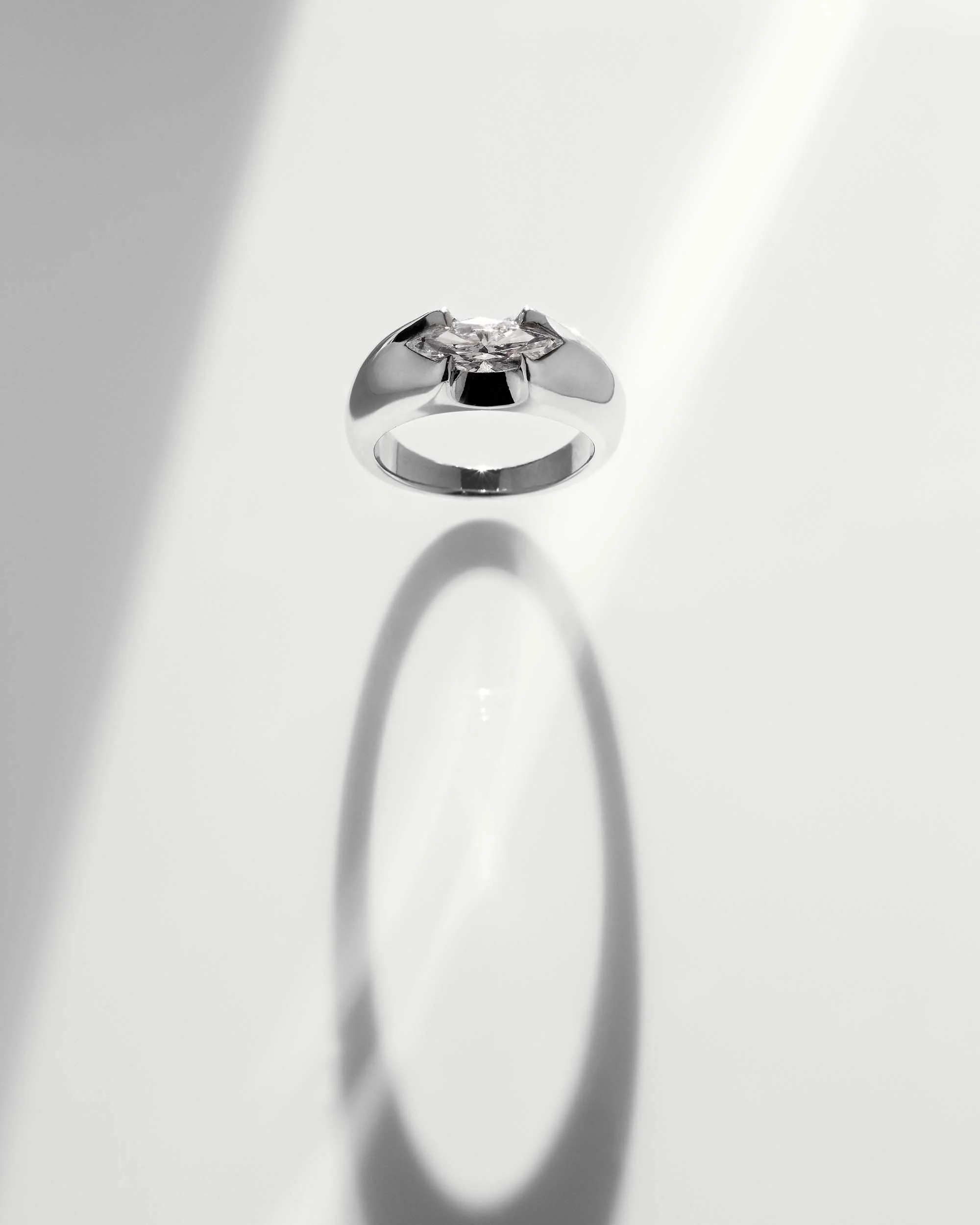 Liv Luttrell Spear Tip Diamond Engagement Ring. White gold with natural marquise diamond, high polish finish.