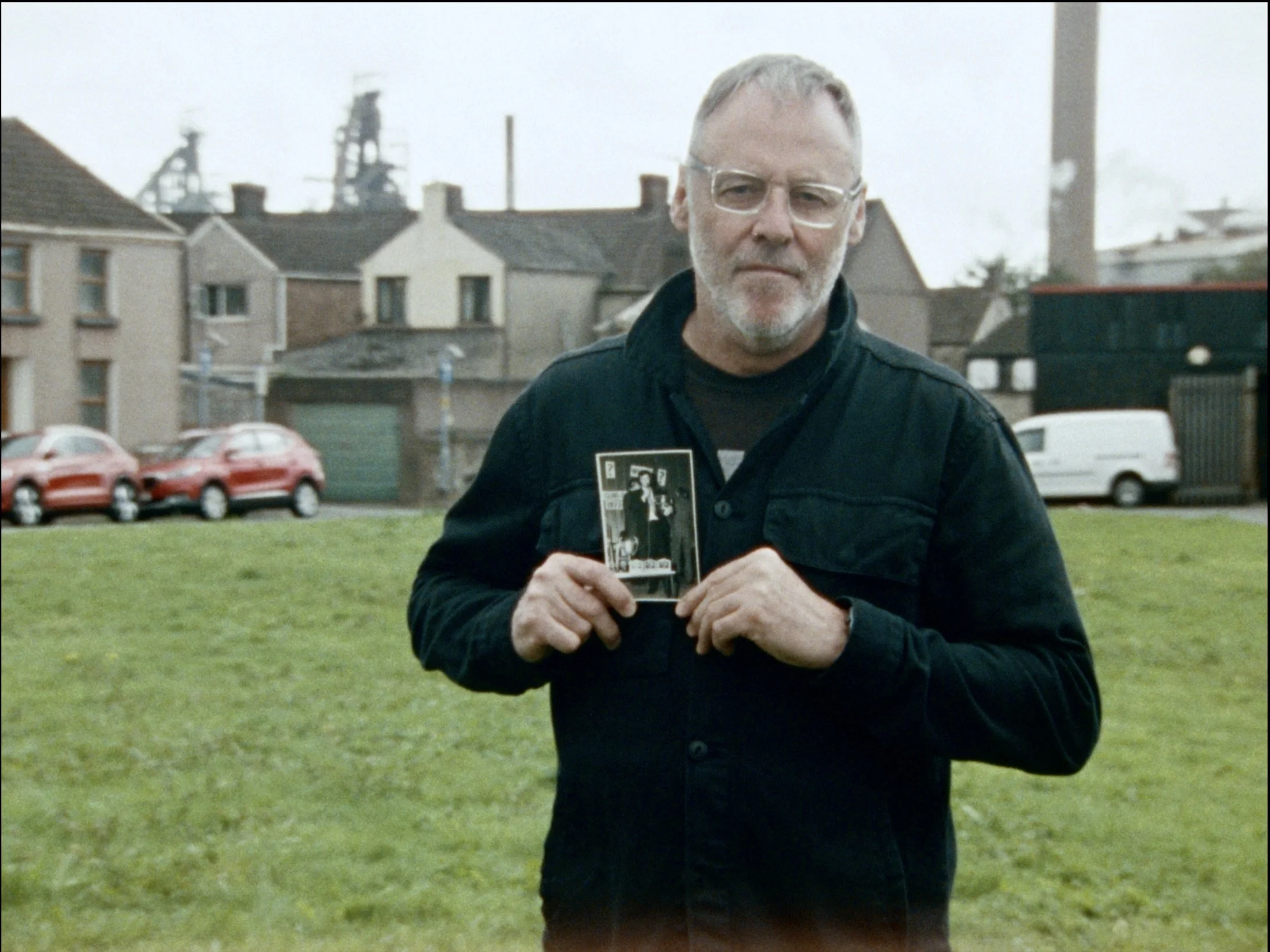 STBOU_Image_5_steelworker_and_photo.jpeg