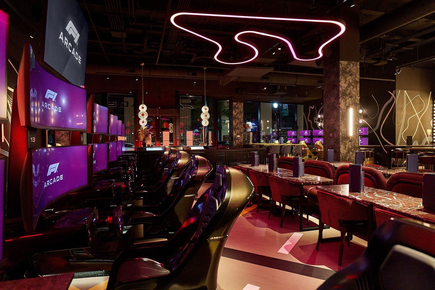 An entrance designed to make an impact.

For F1 Arcade Philadelphia, we have transformed a former empty retail unit into a bold, light-filled destination built for the night. The layout creates pockets of semi-private space, cleverly divided with plu