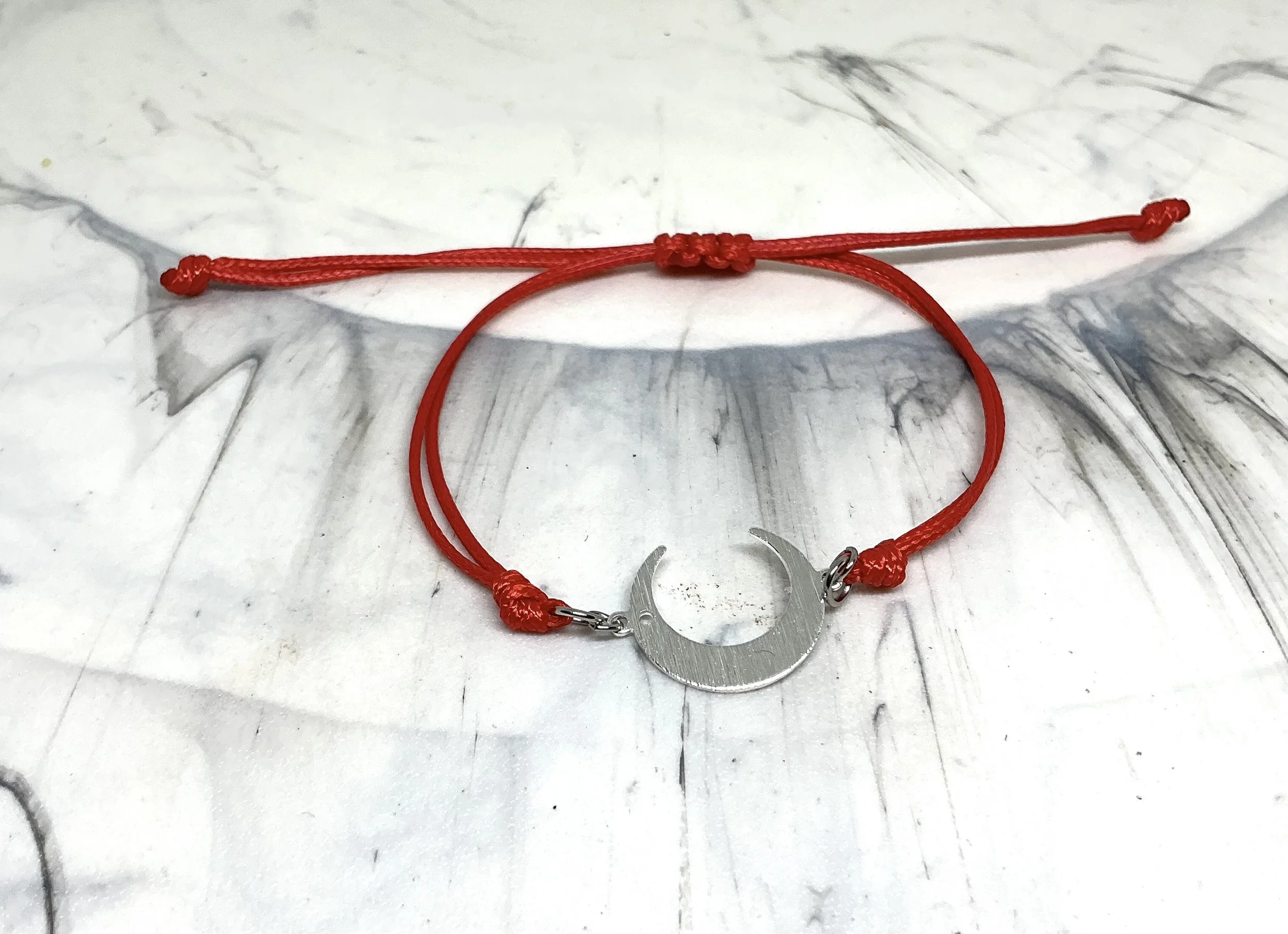 Moon and red bracelet