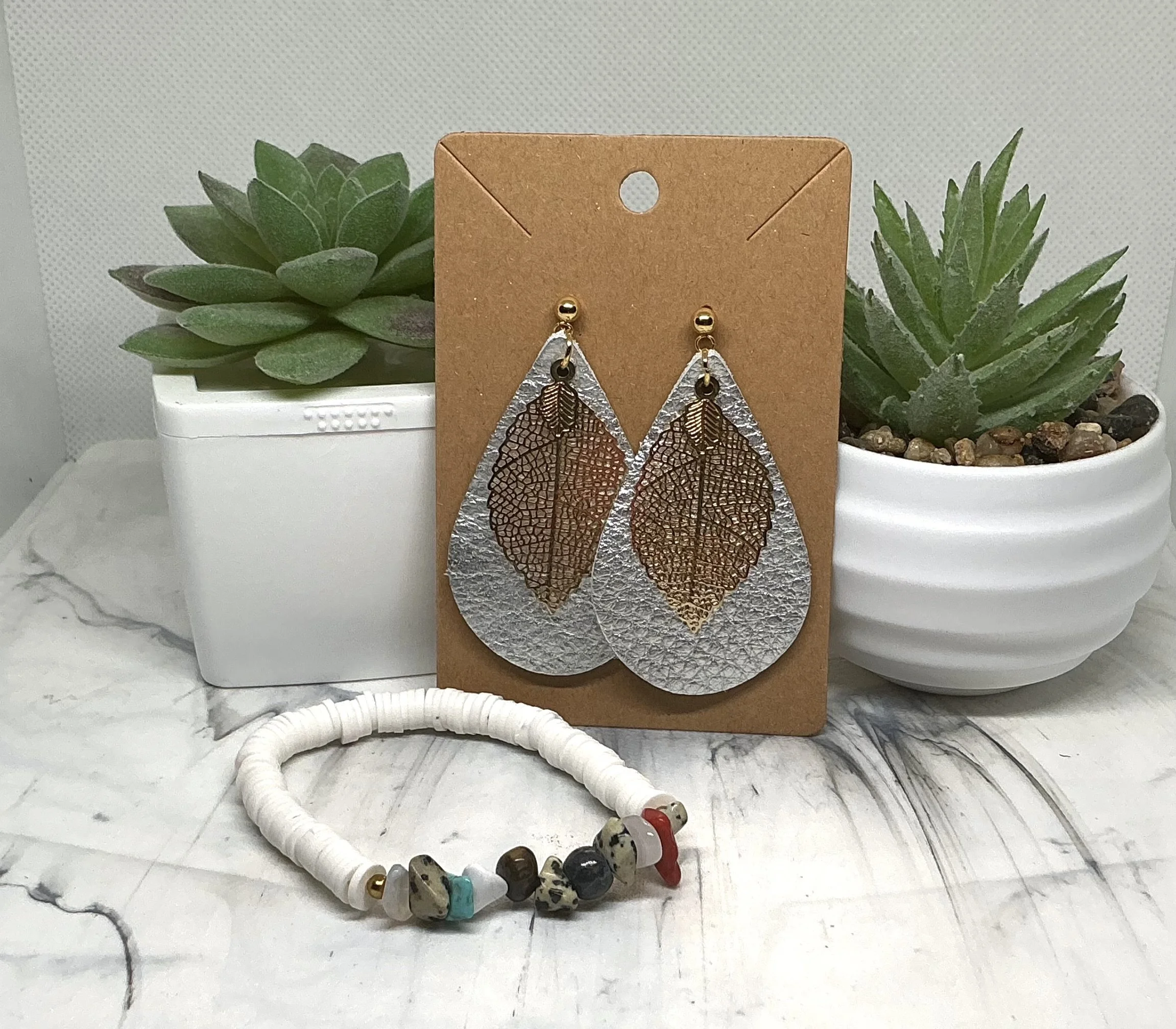 Silver and golden Earring and bracelet set