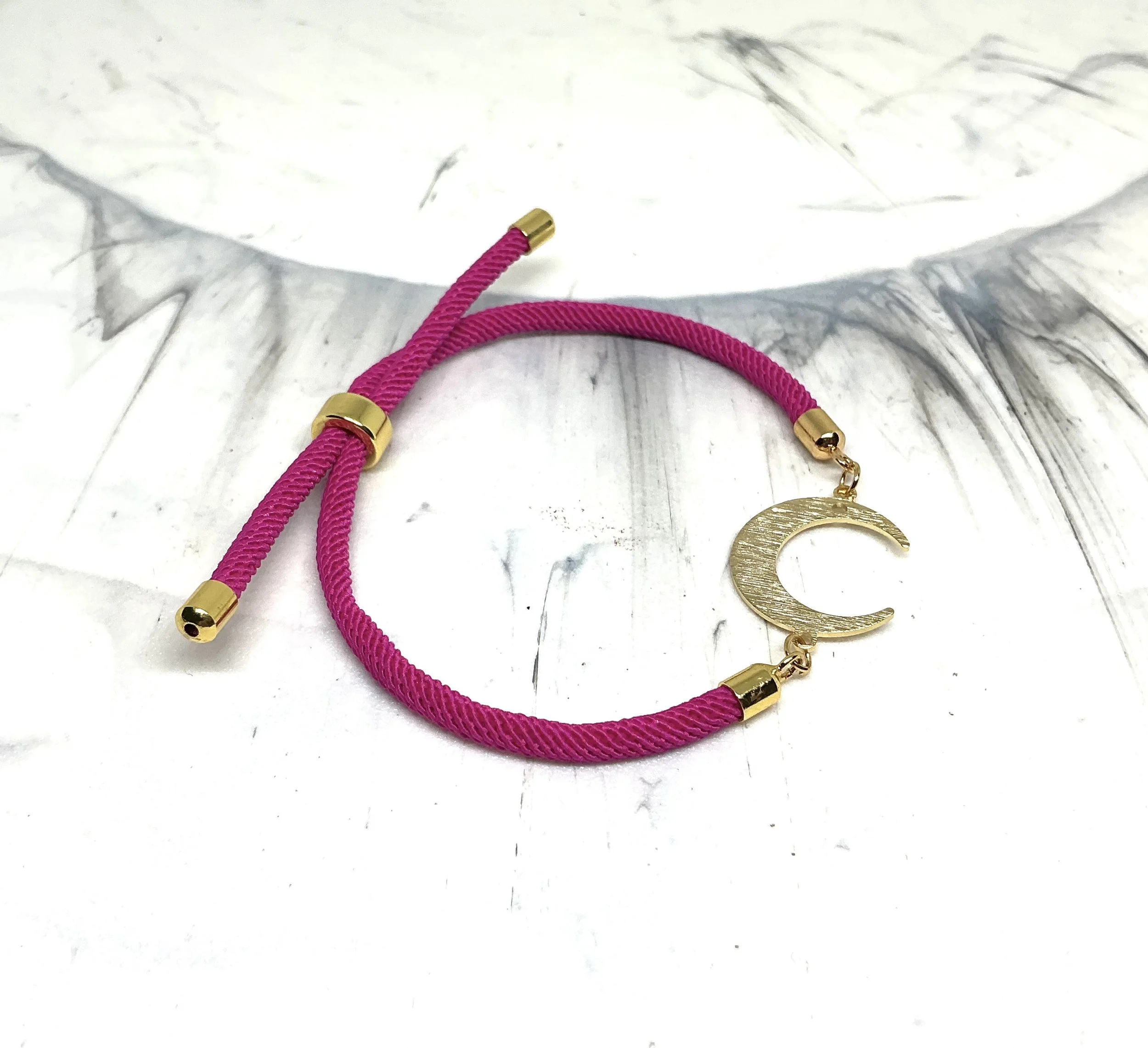 Fuchsia and moon bracelet