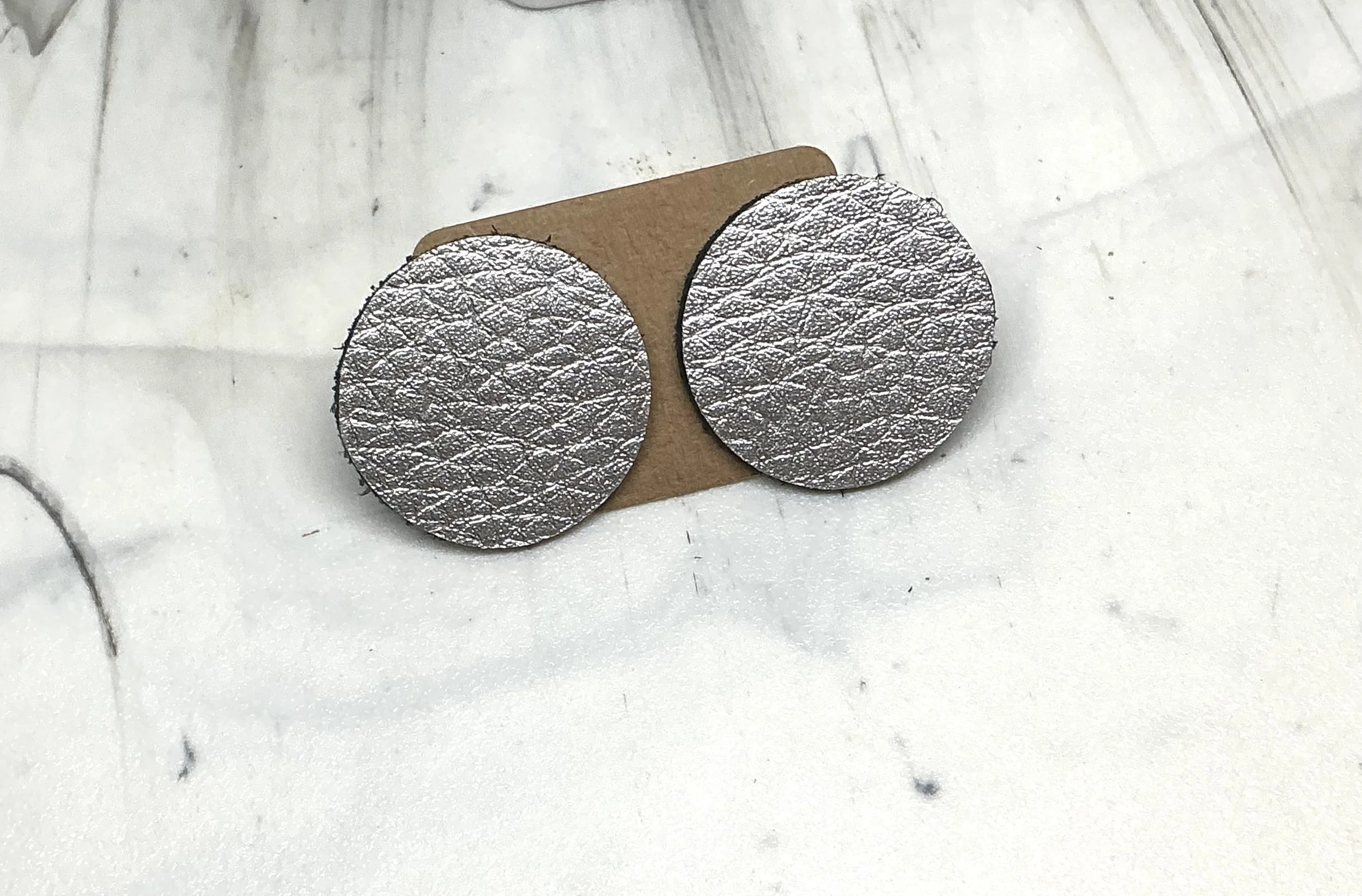 Silver dot stud earrings