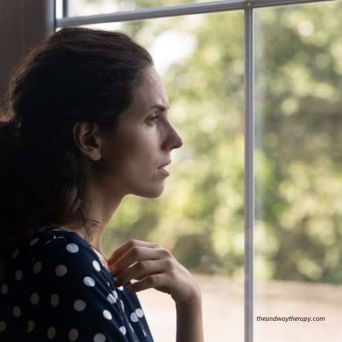 Adult woman reflecting on emotional trauma