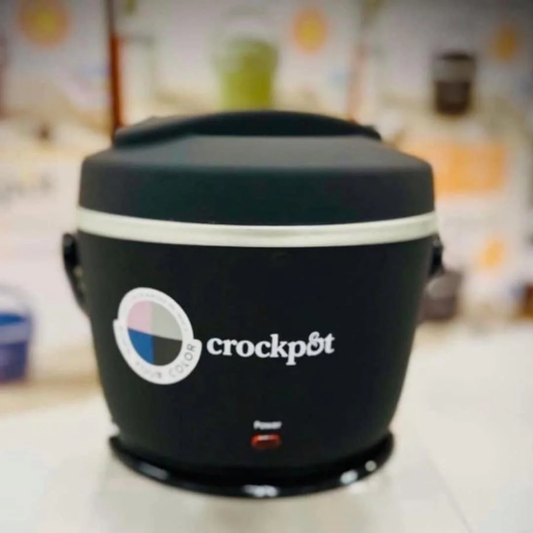 Black Crock-Pot portable electric lunch box with compact food warmer design on display