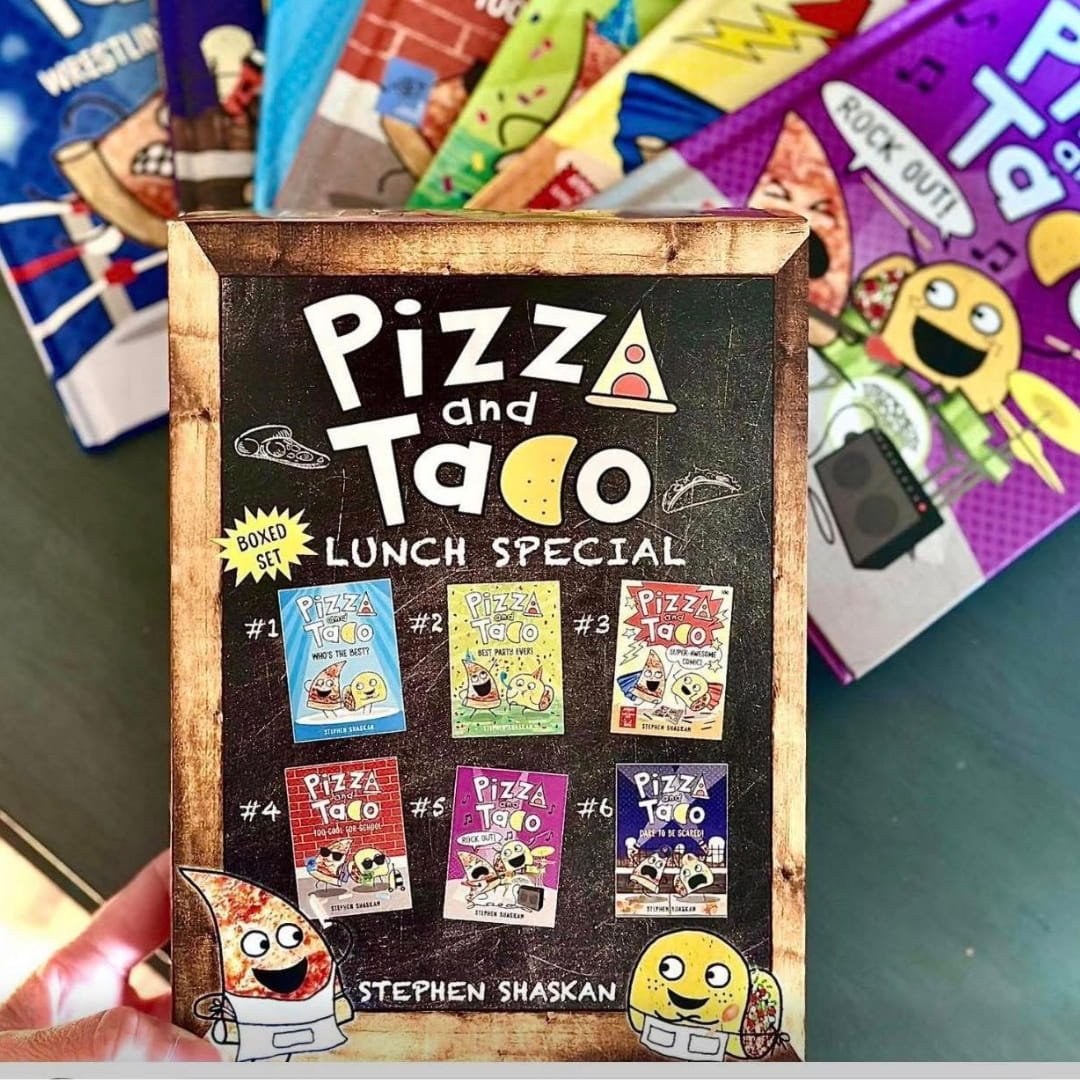 Pizza and Taco: Lunch Special boxed set featuring six children's books by Stephen Shaskan, with playful chalkboard-style packaging and colorful character illustrations of a pizza slice and taco.