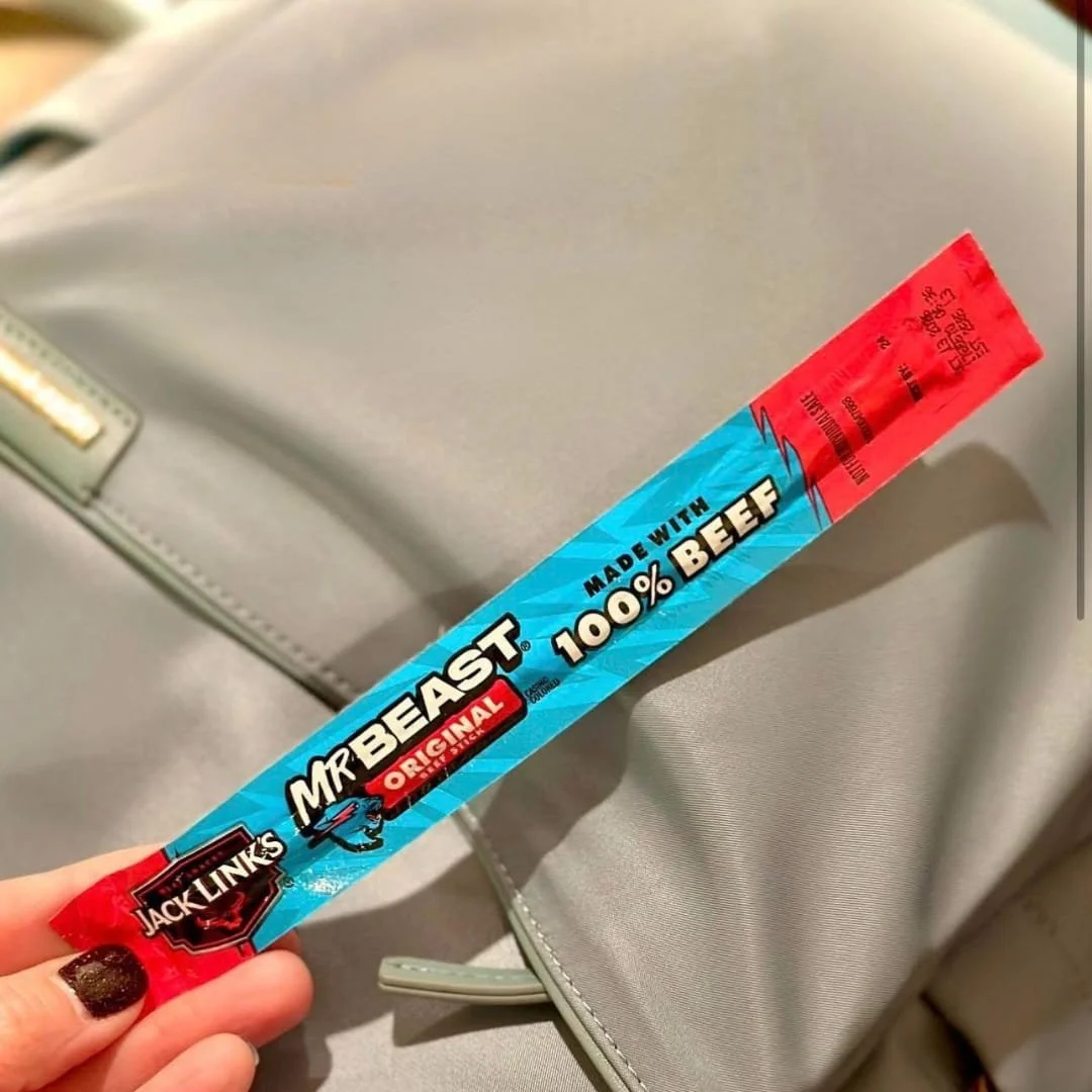 Jack Link’s Beef Sticks snack packs, featuring individually wrapped beef sticks in a resealable bag, perfect for on-the-go protein and snacking.