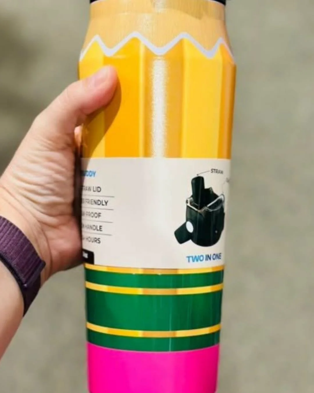 Frost Buddy insulated water bottle designed like a yellow pencil with a pink eraser base and built-in straw lid