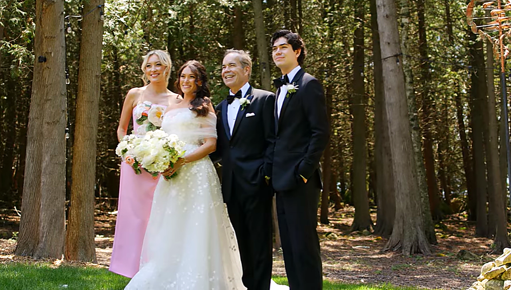 Wedding party portrait in the woods with bridesmaid and groomsman