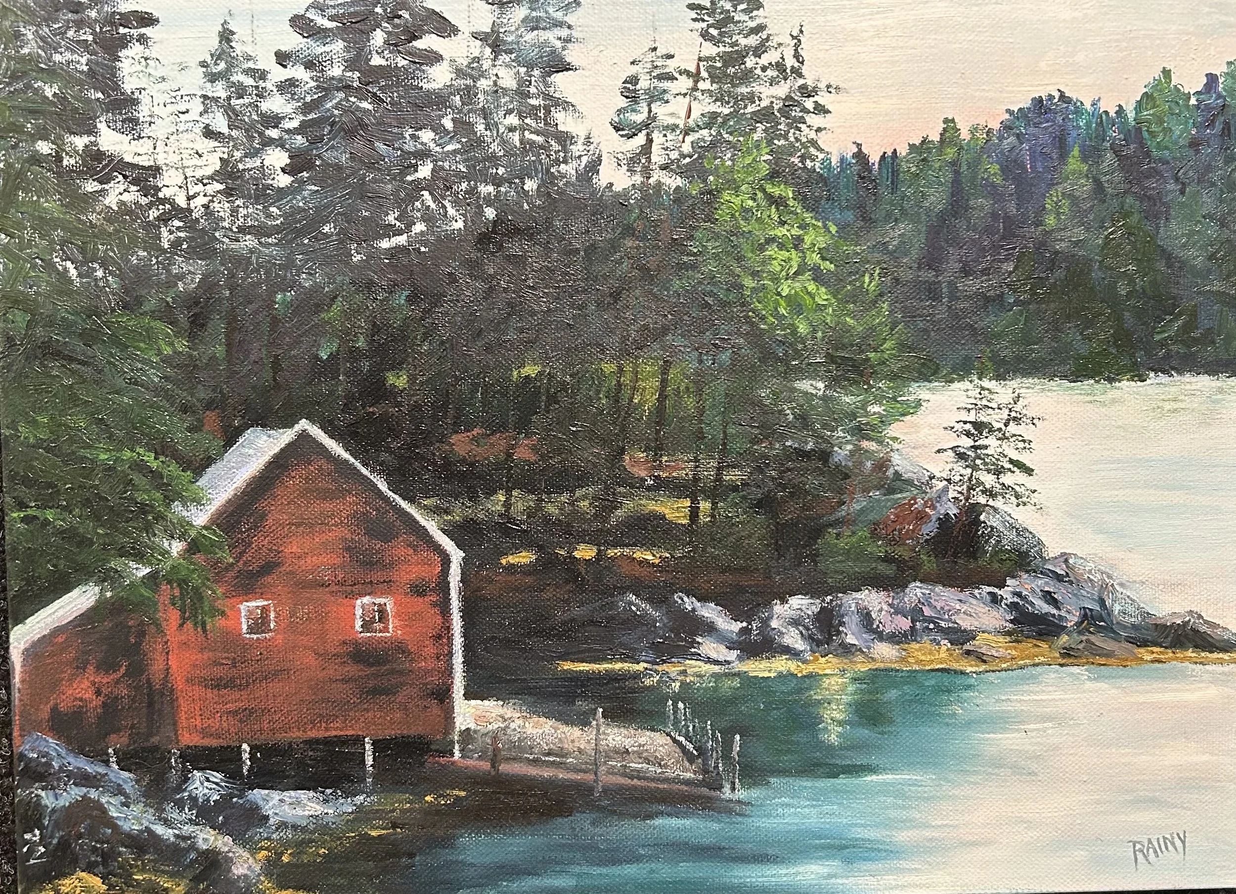 A painting of a lakeside scene featuring a red wooden boathouse in the foreground, surrounded by trees and rocks, with a lake and forest in the background during daylight.