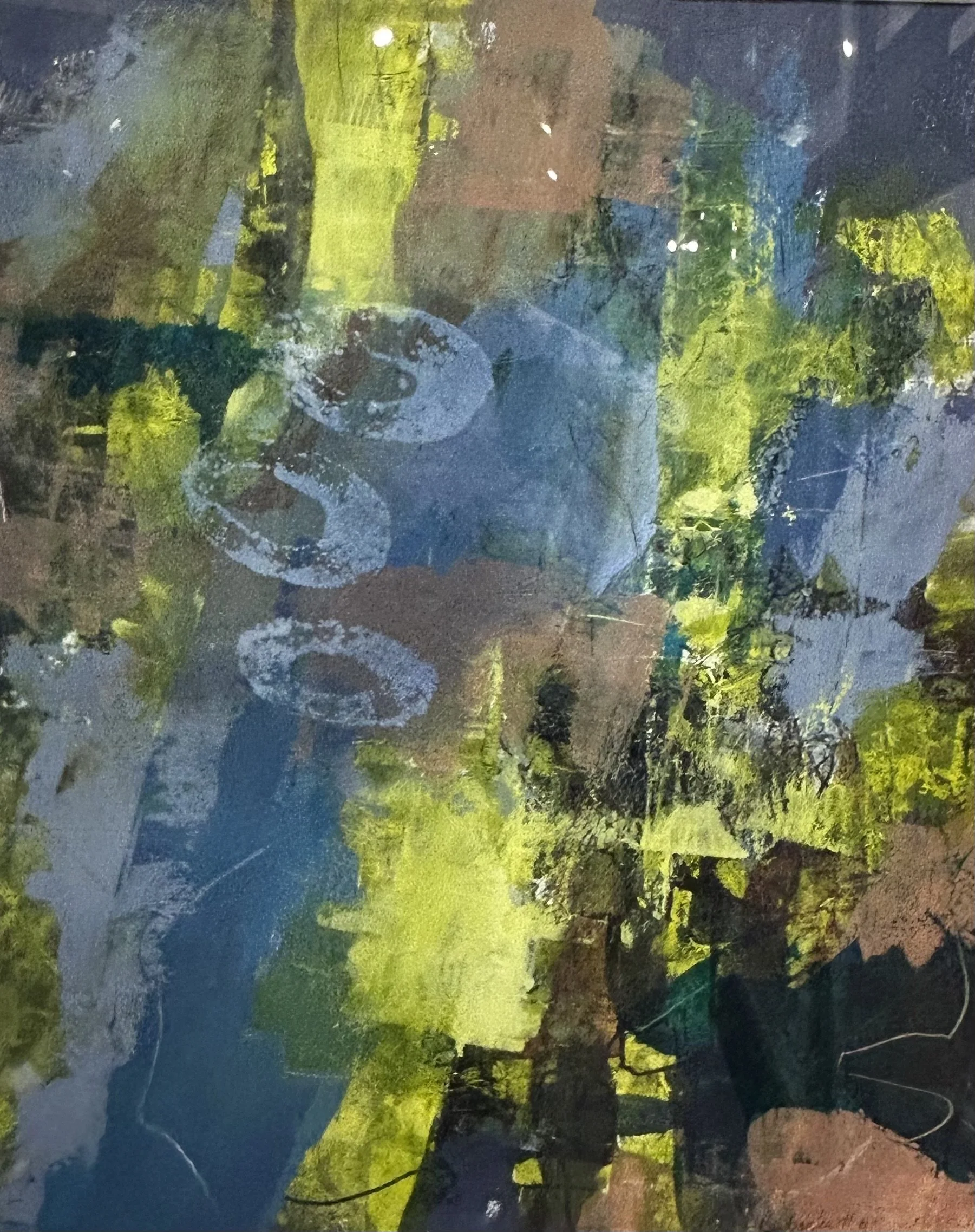 Abstract painting with green, blue, brown, and black colors, featuring a faint white skeleton hand outline.