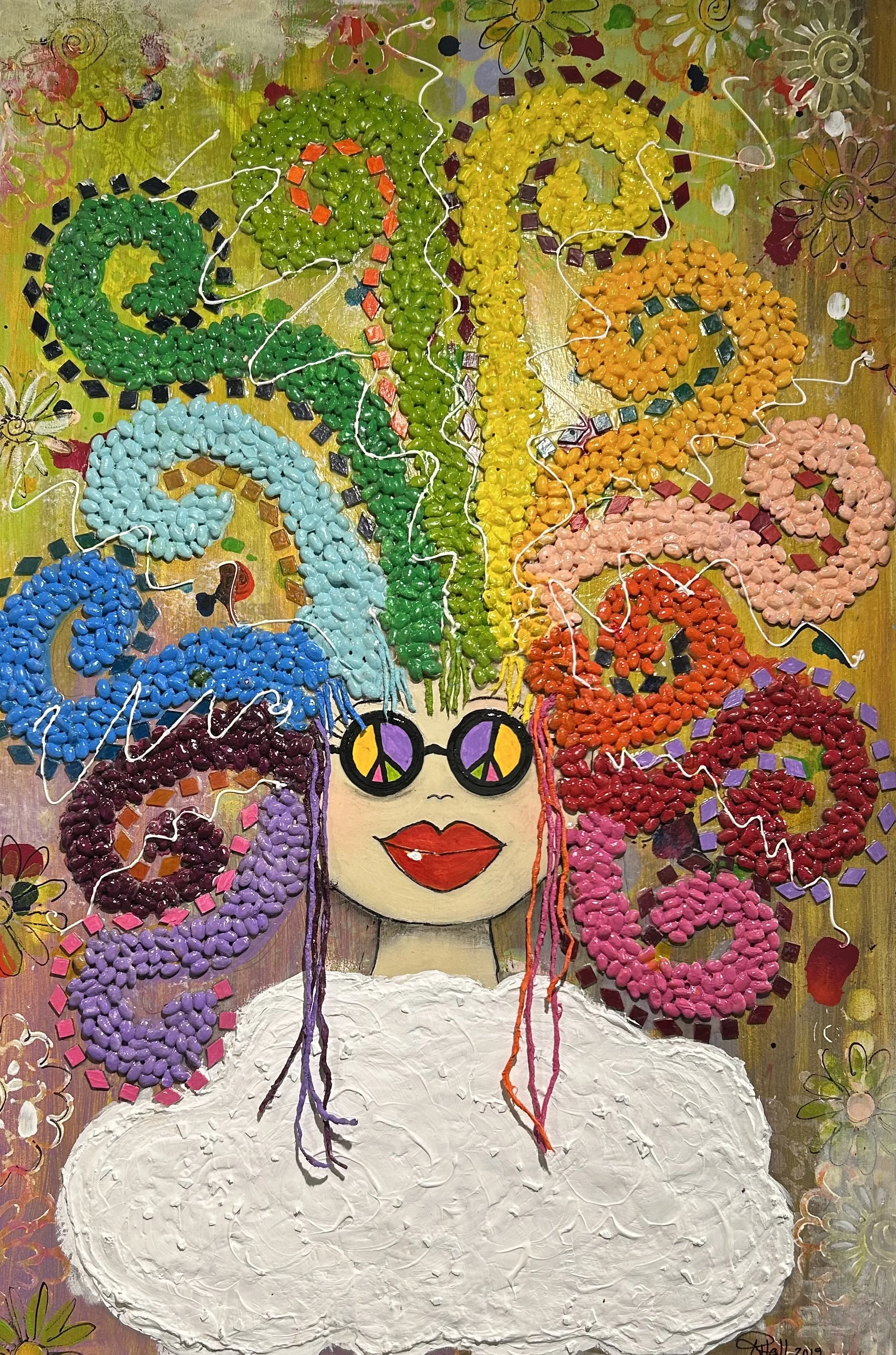 A colorful mixed media artwork of a woman with rainbow-colored hair made from small painted objects, wearing sunglasses with peace signs in the lenses, red lips, and a white cloud-like top. The background features painted floral patterns and vibrant colors.