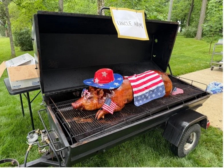St. Charles Center celebrates employees with hog roast dinner