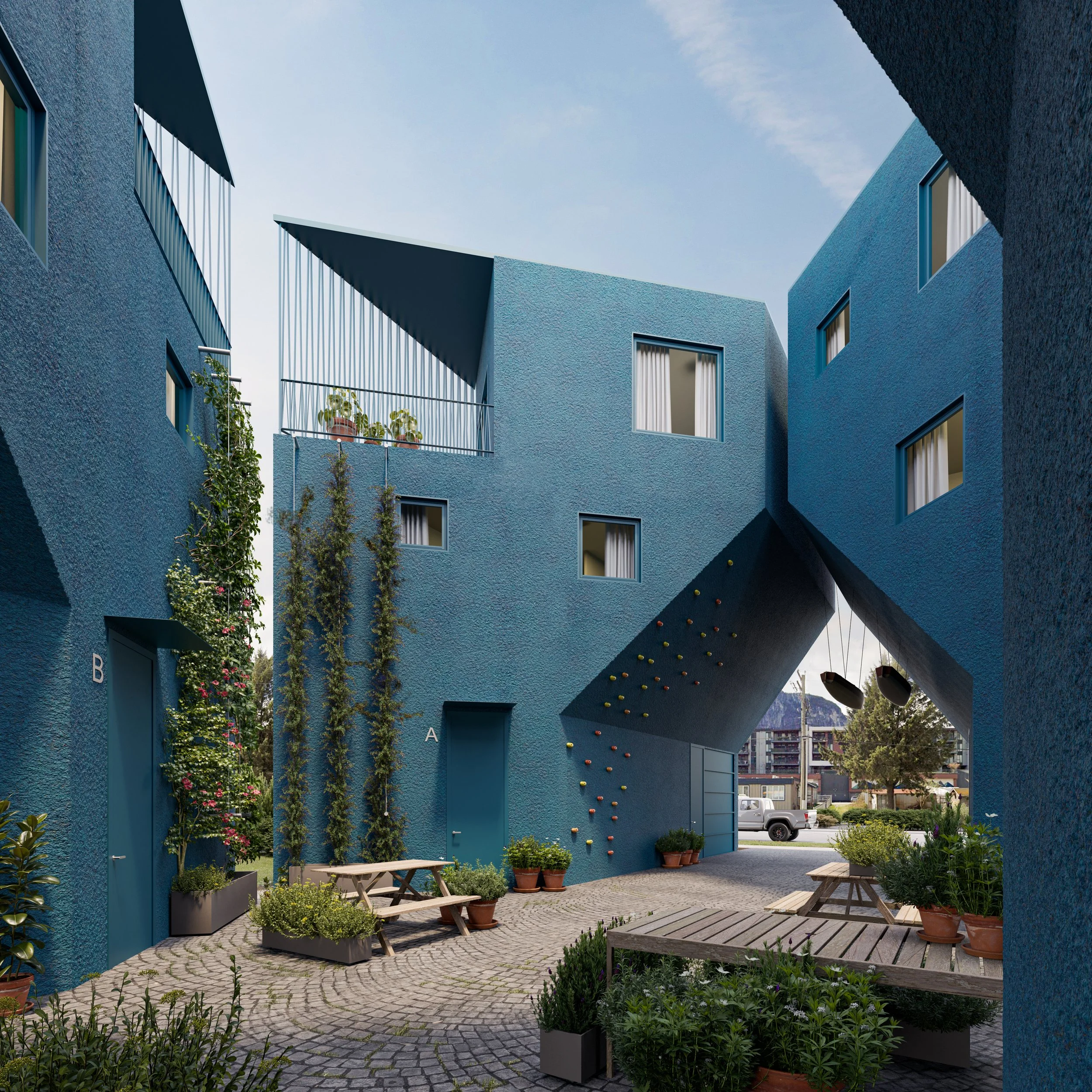 A modern blue apartment building with a courtyard featuring potted plants, wooden benches, and climbing plants on the walls. There is a climbing wall on the underside of an overhanging section, and swings hanging from above. The building has small windows and a rooftop balcony with potted plants.