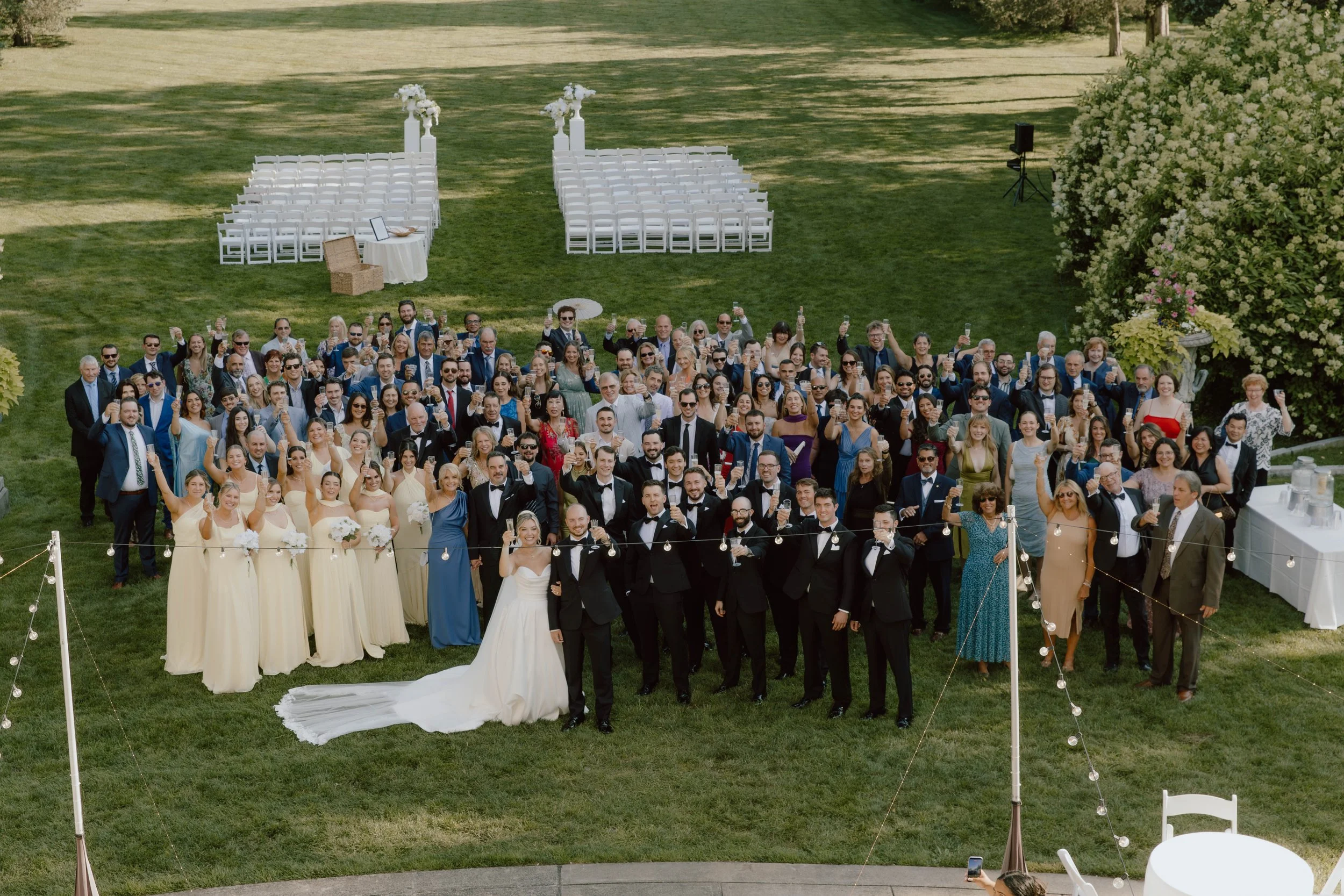 Aerial view of a Connecticut wedding reception, with all their favorite people gathered to celebrate! Reception and ceremony coordination by Small Town Moments.

Photo by Abbey Vee Photography  
@abbey_vee_photography