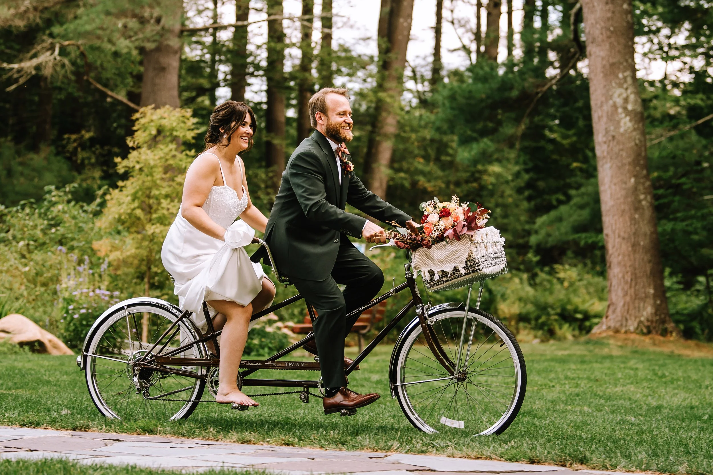 A fun moment with one of our Massachusetts couples, riding into their wedding day with a tandem bike, plenty of laughter, and the personal touches that made their celebration uniquely theirs. Coordinated by Small Town Moments.

Photo by Jenna Lynn Ph