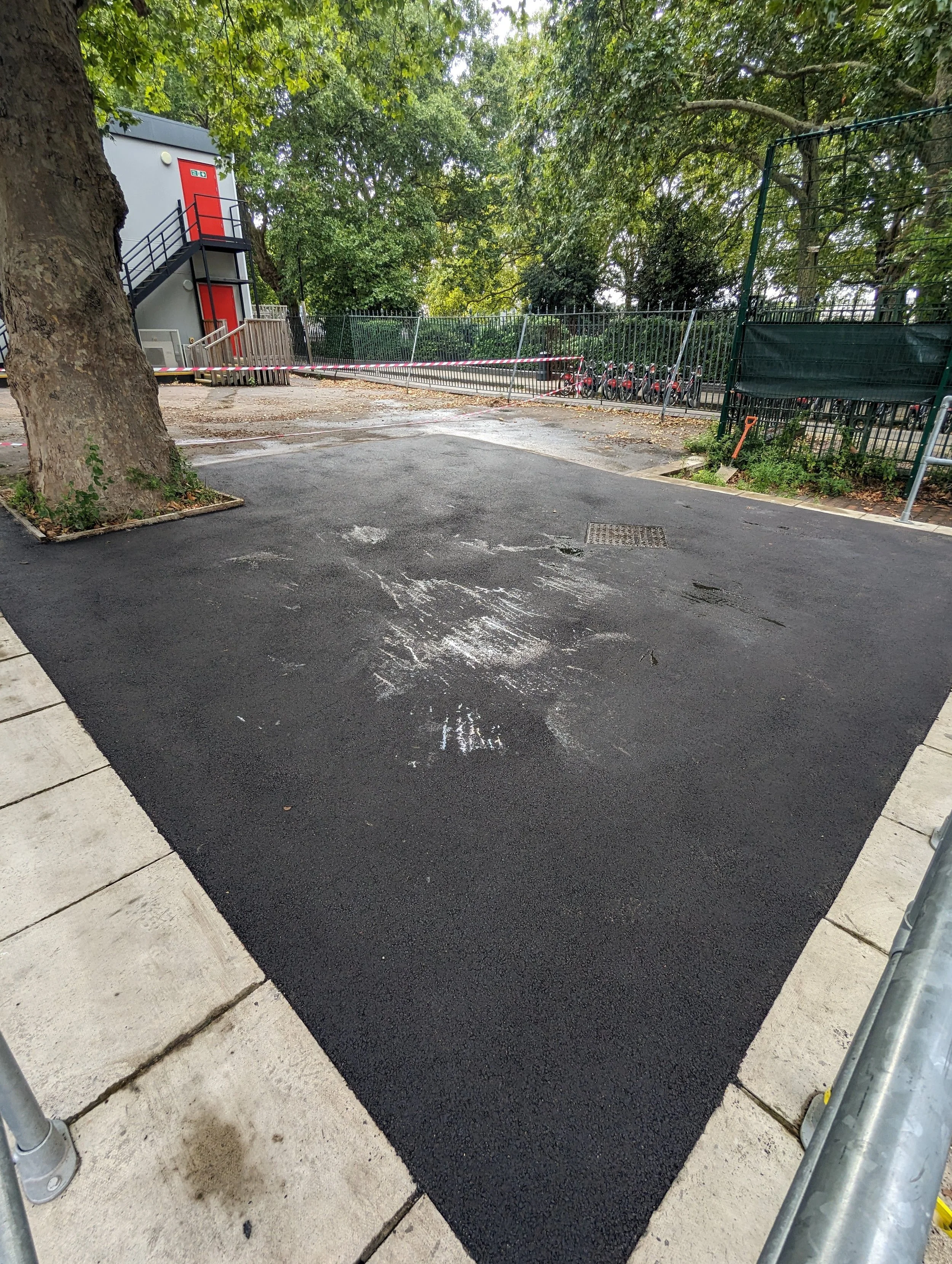 reinforced concrete base laid for tarmac repair at school isle of dogs east london