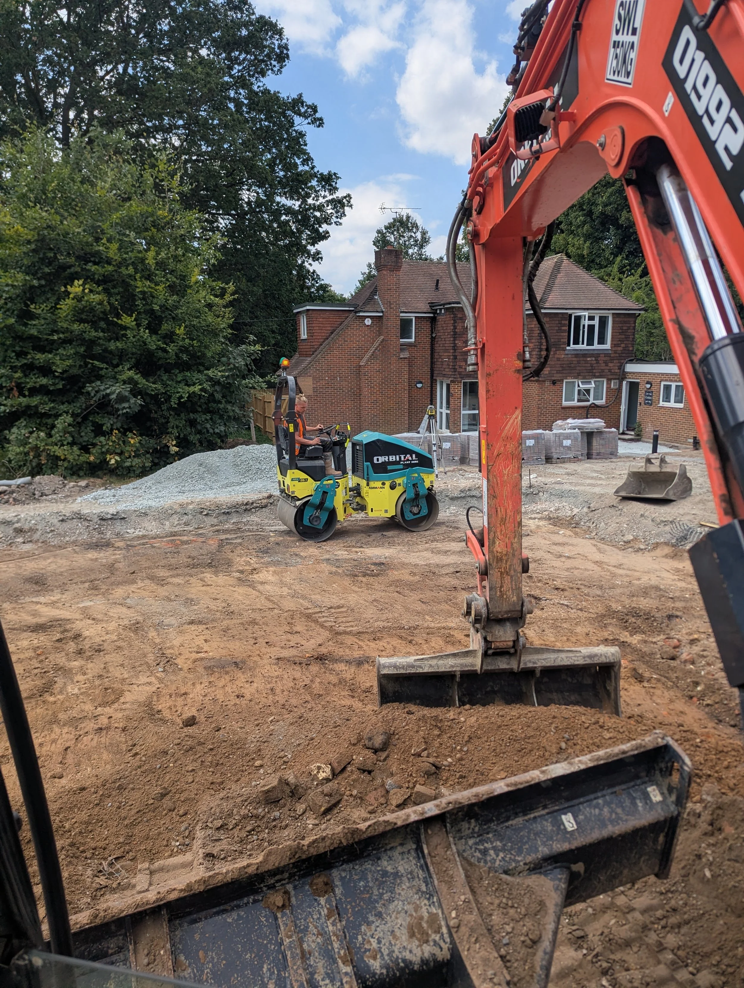 sen school croydon digger roller excavating car park resin