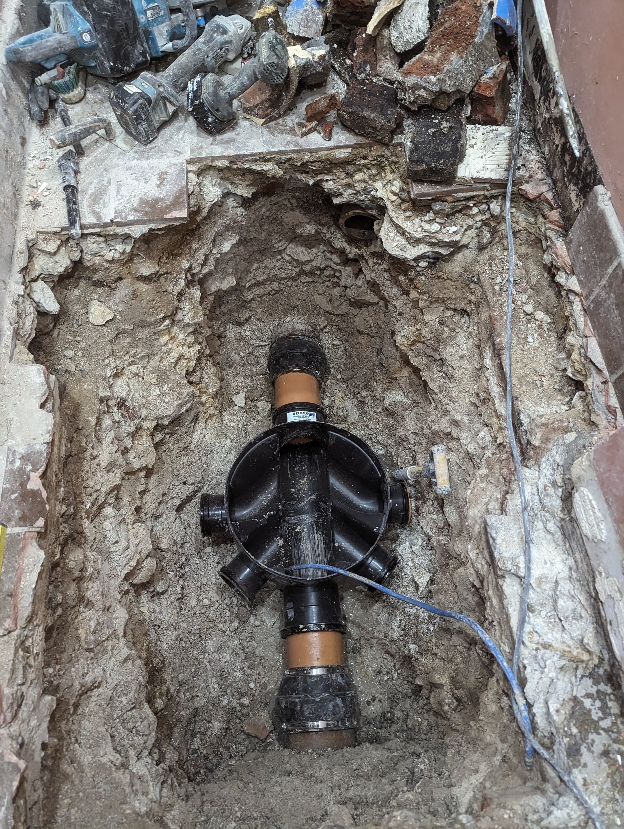 inspection chamber installed on victorian sewer to replace failed interceptor trap in brighton
