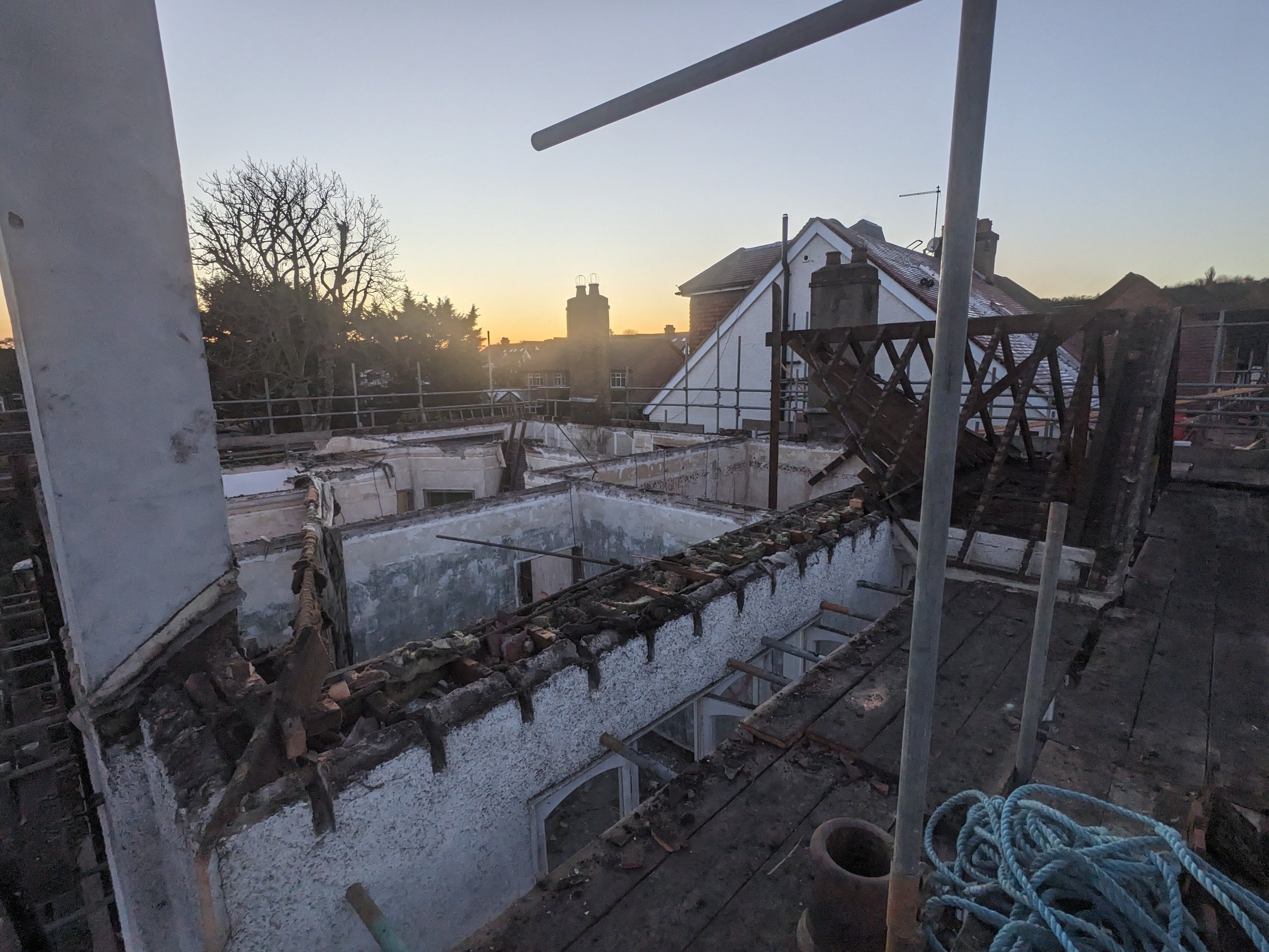 house in chingford with roof stripped off