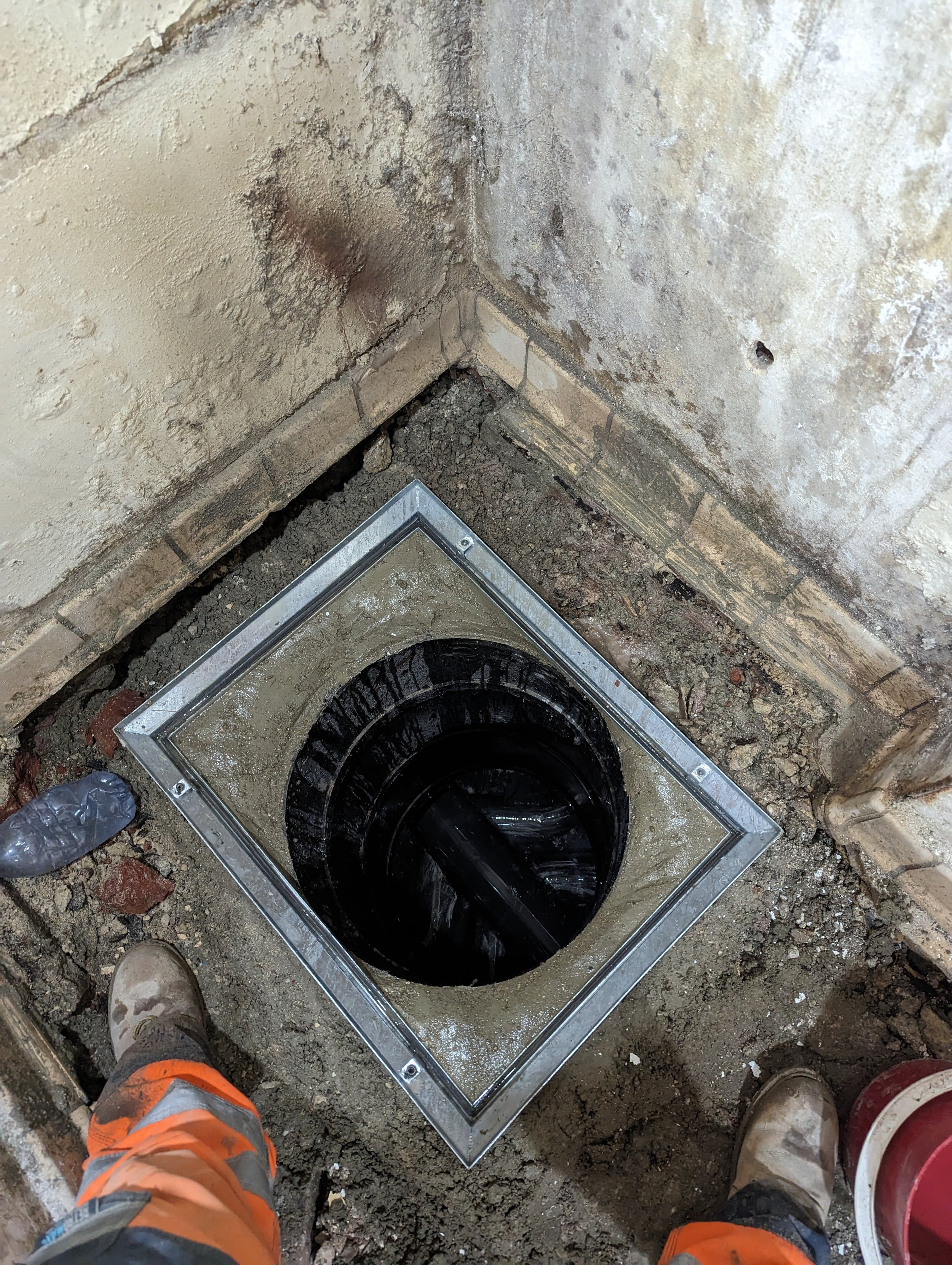 double sealed recessed manhole cover in service area in supermarket in brighton