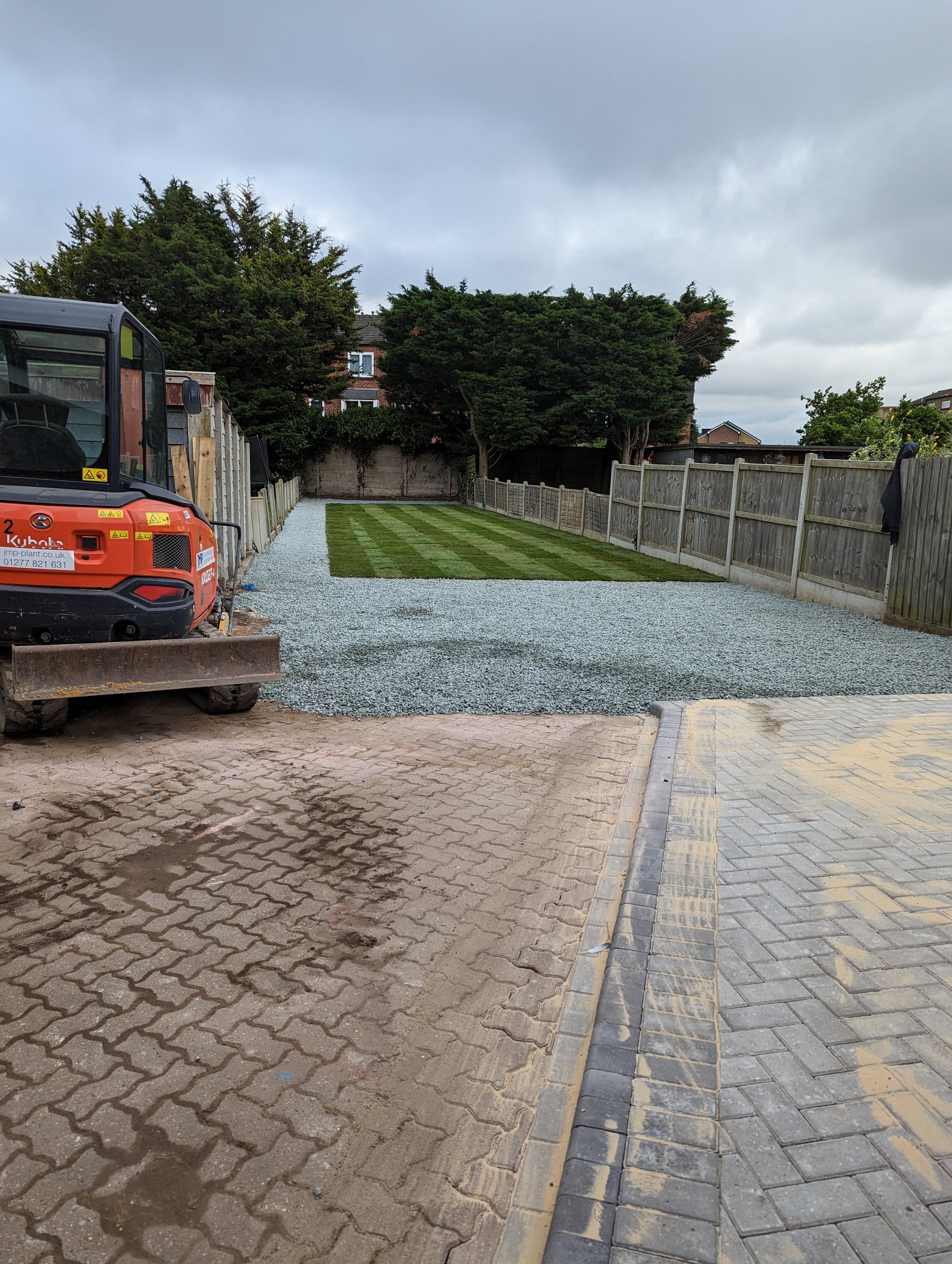 rear garden in romford with new turf, gravel path and block paving