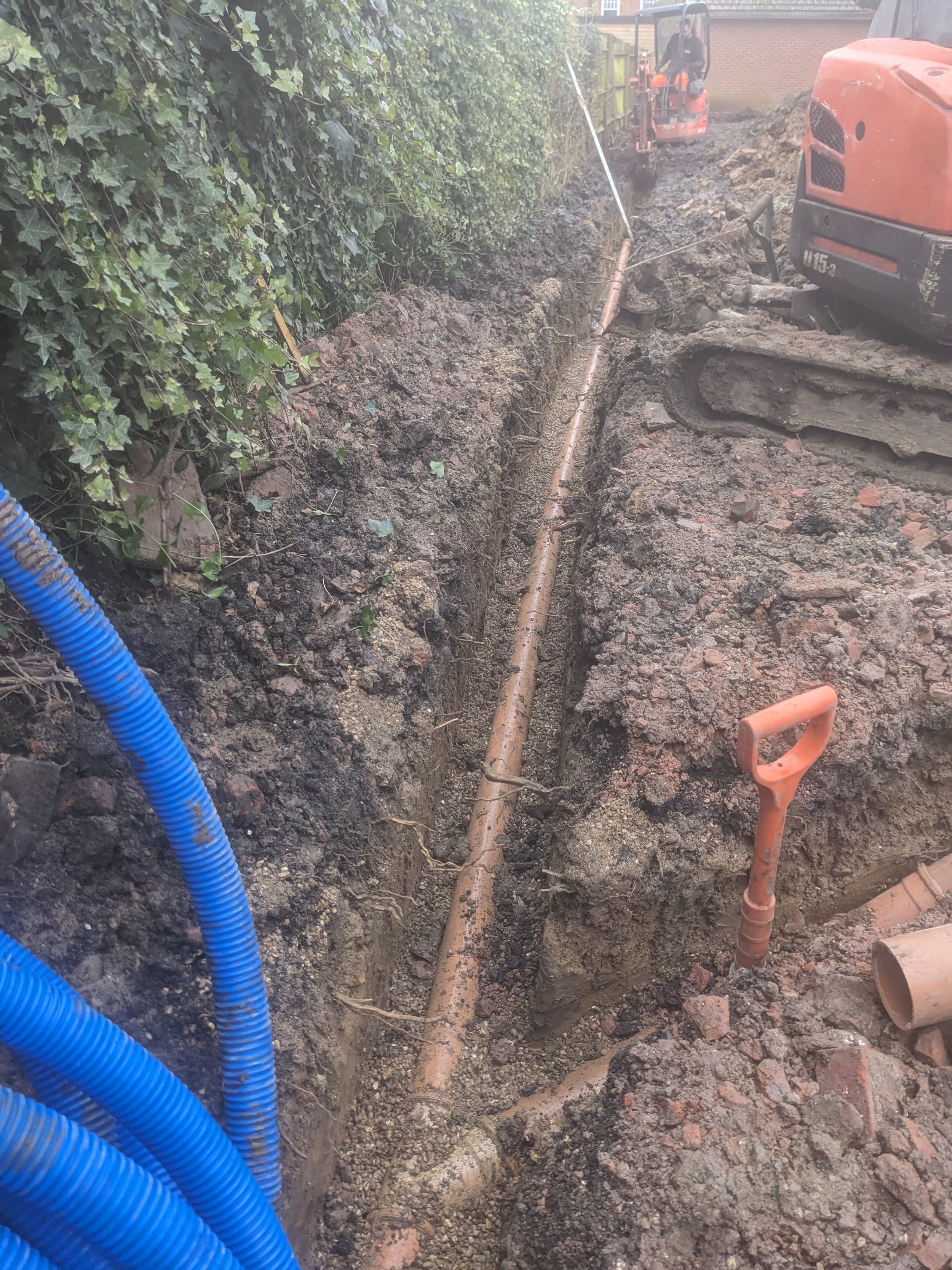 underground drainage being installed for garden building in chingford