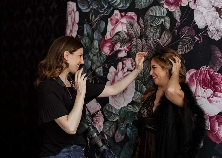 Liz Hansen posing a woman for boudoir in Winnetka studio