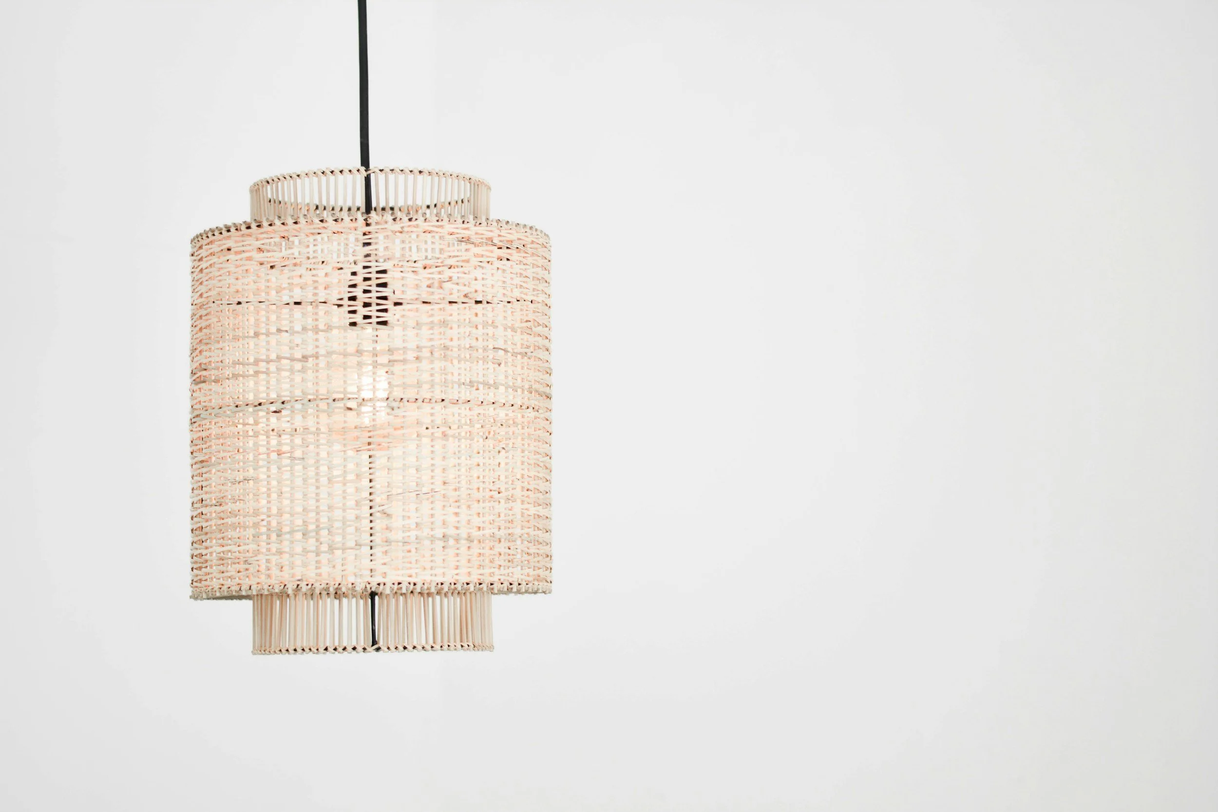 Modern pendant lighting installation over kitchen island