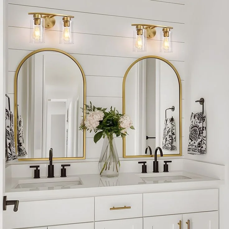 Bathroom renovation with stylish vanity lighting