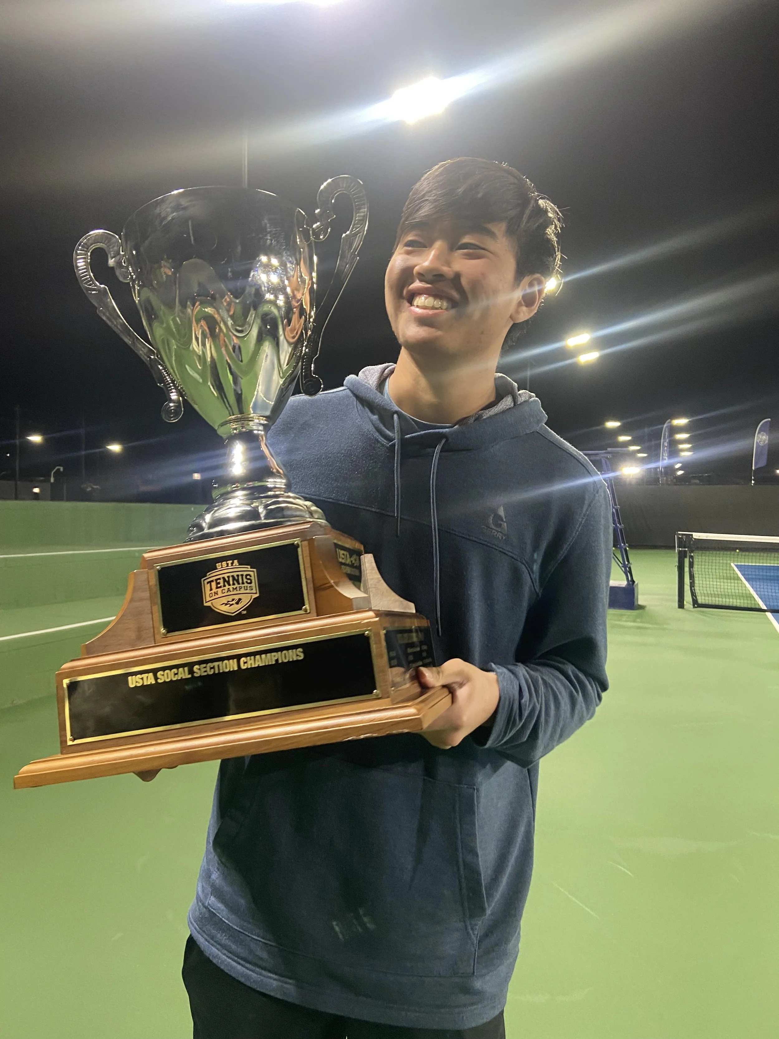 kyle with trophy.jpg