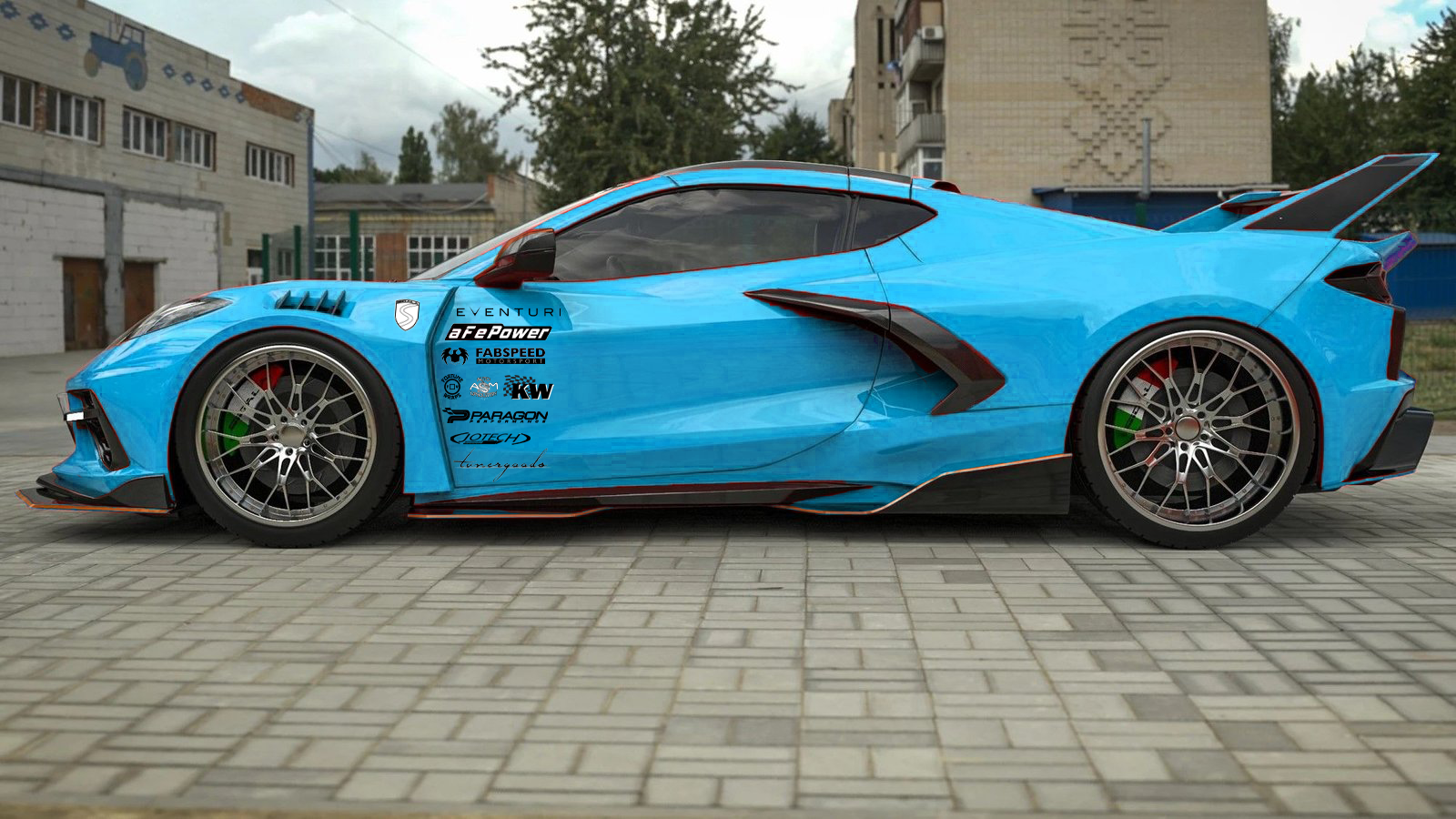 Blue sports car with racing decals parked on a paved surface with buildings and trees in the background.