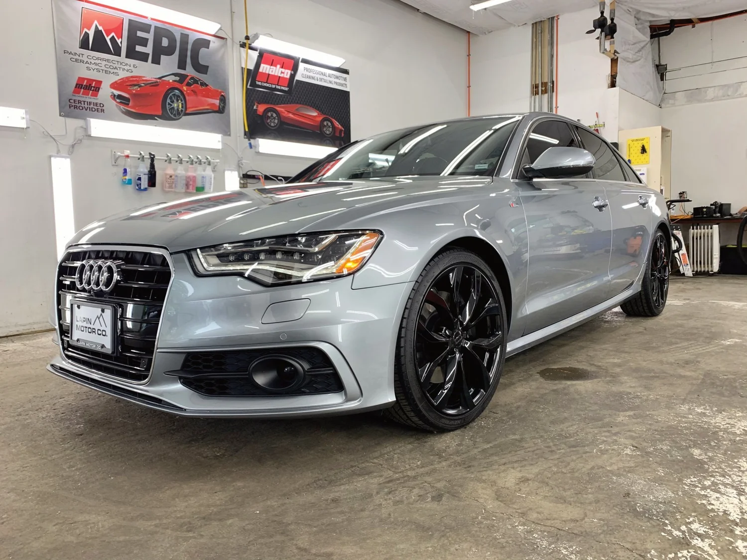 Silver Audi sedan after a full exterior detail at Coastline Auto Detail