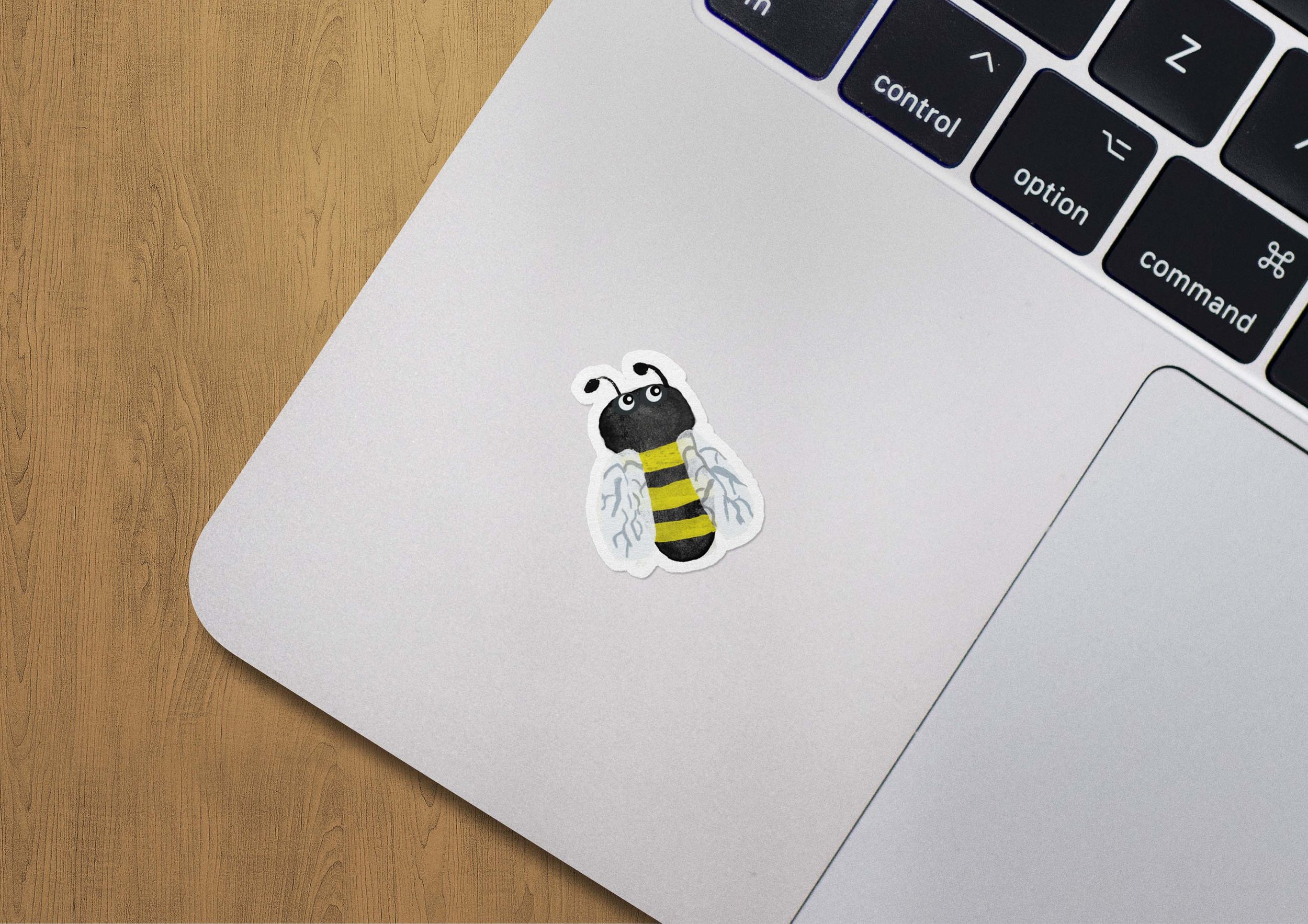 Bee_LaptopSticker_Mockup.jpg