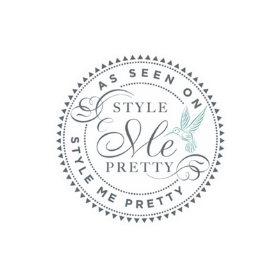 A circular design with the words 'As Seen On Style Me Pretty' and the phrase 'Style Pretty' in the center, featuring a hummingbird illustration.