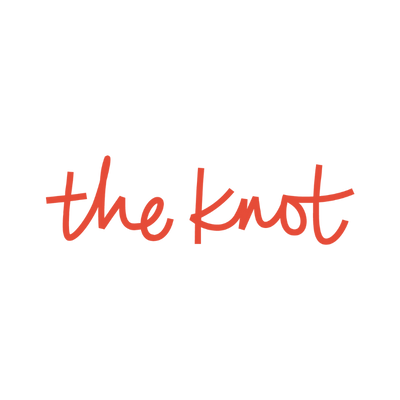 Handwritten red text 'the knot' over black background.