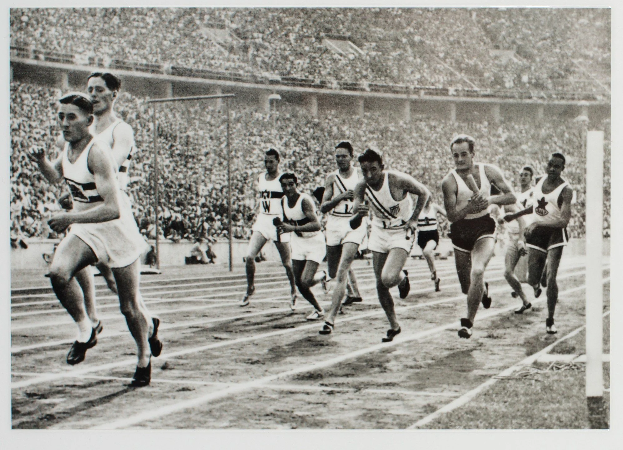 Godfrey Rampling handing the baton to Bill Roberts 4 x 400m Track Gold Medallists Berlin 1936 Now that the athletics has started at the Paris Olympics here in 2024 its worth looking back on Gold medal track winners from the past. In 1995 I took portr