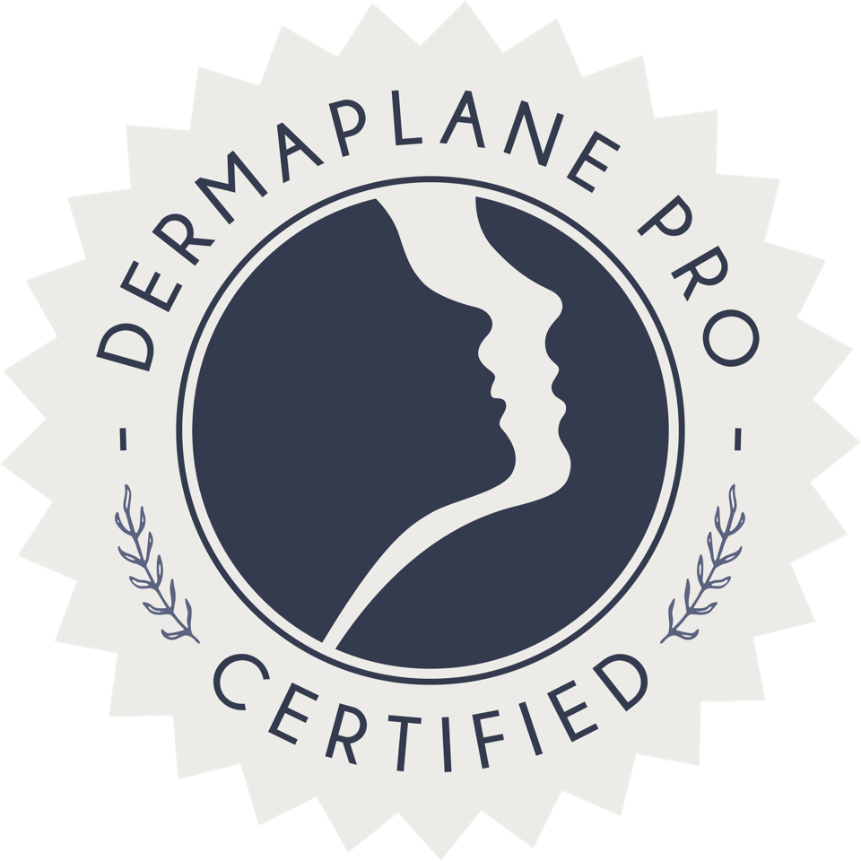 A certification badge with a starburst shape, featuring a silhouette of a woman's face in profile and a child's face in profile facing each other, with the text 'DERMAPLANE PRO' at the top and 'CERTIFIED' at the bottom.