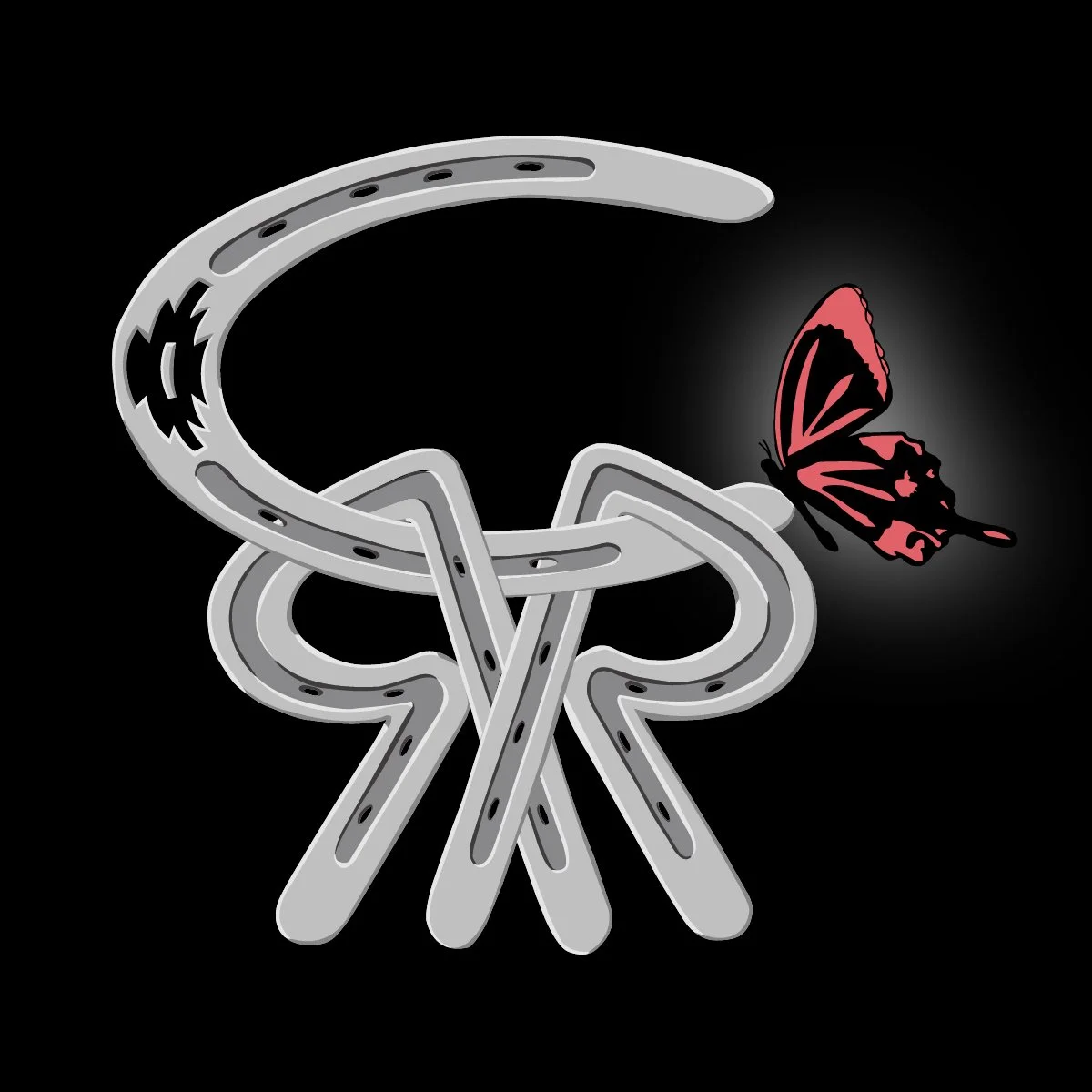 A silver ring with a butterfly design and a red and black butterfly attached to it, set against a black background.