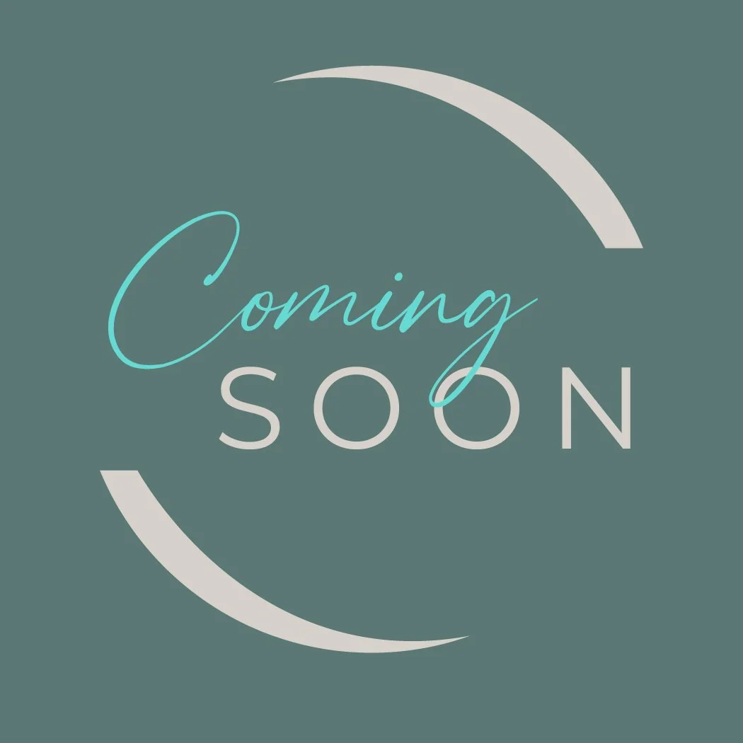 A teal background with a white crescent shape at the top and bottom, and the words 'Coming Soon' written in teal and white cursive and uppercase letters.