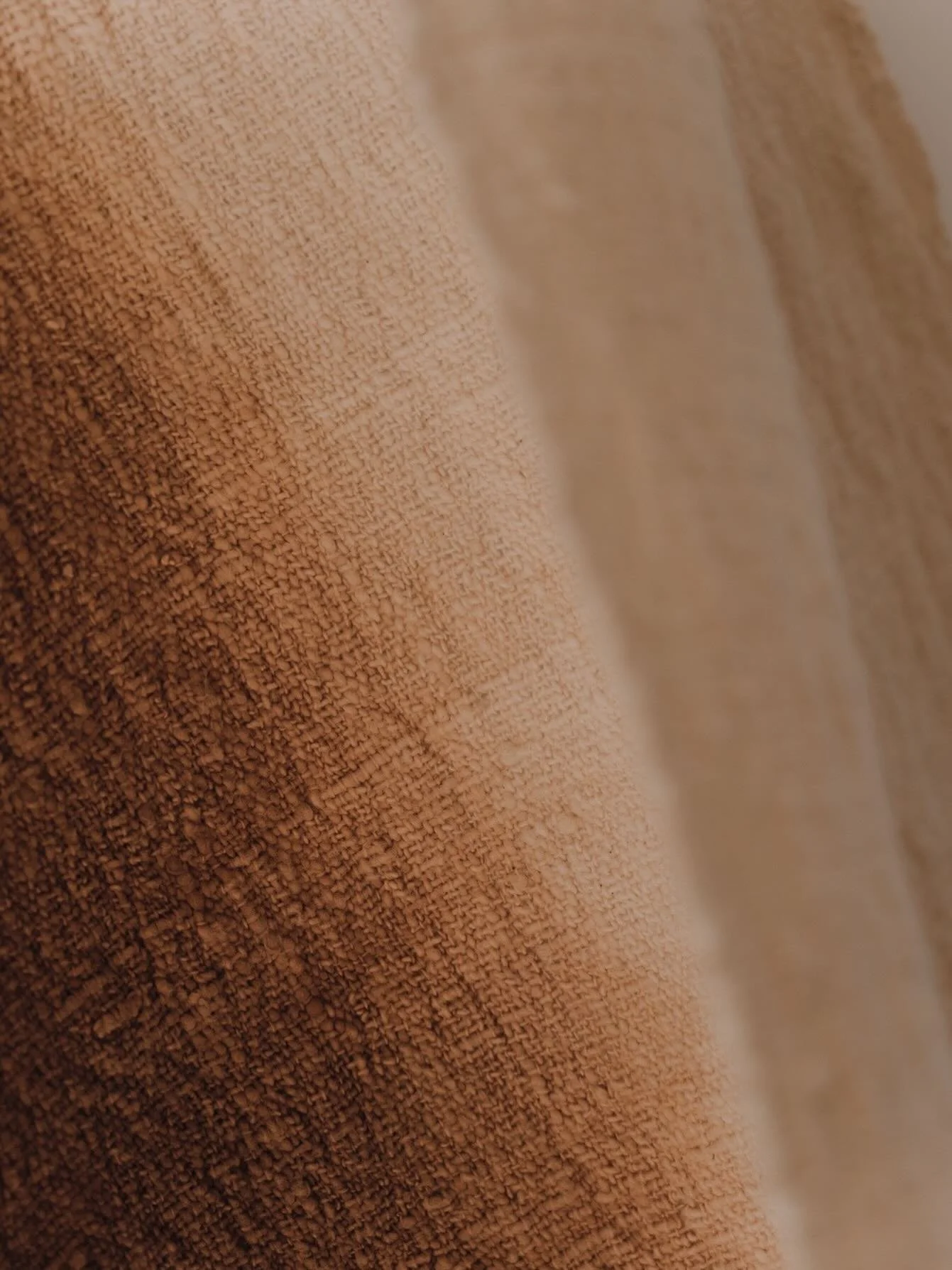 *

Ana, up close.
Cotton, plant-dyed, woven by hand in Indonesia.

Made slowly, in limited quantities, by artisans who know the rhythm of the material.

A piece to live with &mdash; to soften a space, to be used, to stay.

Available online at Tentful