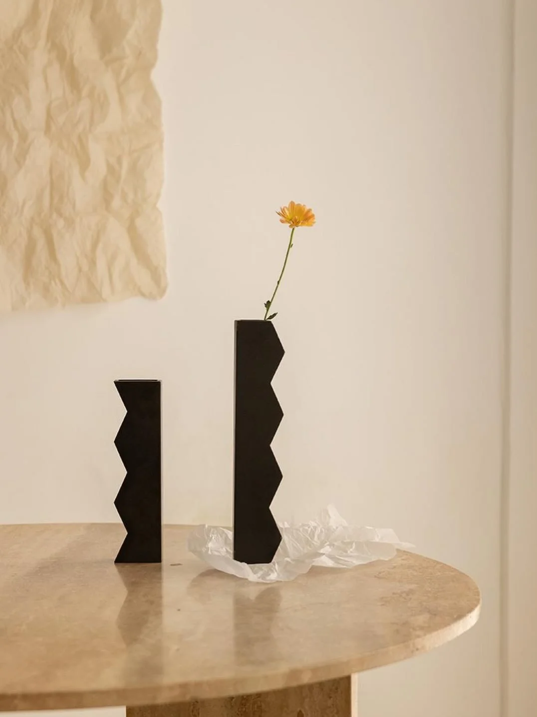 *

Teresa vases.

Two handcrafted metal pieces
designed to change through arrangement and perspective.

Together they form a sculptural composition,
apart they take on a different presence.

Objects made to evolve naturally within a space.

www.tentf